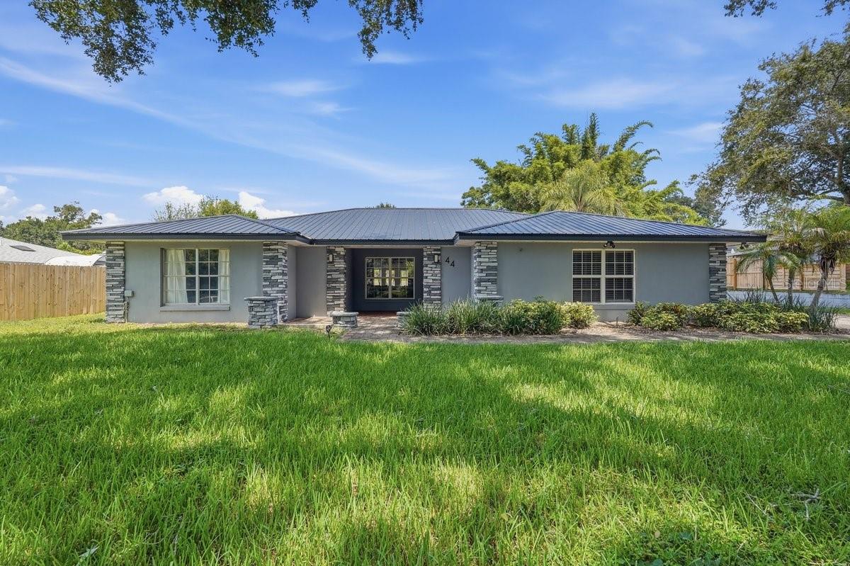 Welcome home to this spacious 3-bedroom, 2-bath pool home offering 2,269 square feet of living space, with an inviting layout designed for everyday living and entertaining. Topped with a new metal roof, this home combines valuable recent improvements with plenty of character inside and out.Step inside to an open and expansive living area highlighted by exposed wood beams, recessed lighting, and tile flooring throughout much of the main living space. The updated kitchen features luxury cabinetry, quartz countertops, subway tile backsplash, stainless steel appliances, abundant storage, and generous counter space, all flowing naturally into the dining and living areas.An additional bonus/game room offers exceptional flexibility and could serve as a billiards room, home theater, playroom, office, or second family room. The primary suite features a spacious walk-in closet and an updated bathroom with a large dual-sink vanity, modern fixtures, and beautifully tiled walk-in shower.Step outside to your own Florida retreat featuring a private in-ground swimming pool, paver deck, and tropical landscaping. The expansive screened lanai overlooking the pool provides plenty of covered space for outdoor dining, entertaining, or simply relaxing and enjoying the Florida lifestyle year-round.Additional highlights include a dedicated indoor laundry room, generous storage, spacious secondary bedrooms, multiple living areas, and a large backyard. With its new metal roof, updated interior, private pool, screened outdoor living space, bonus room, and 2,269 square feet of living space, this Winter Haven home delivers the space, versatility, and indoor-outdoor lifestyle today's buyers are looking for.