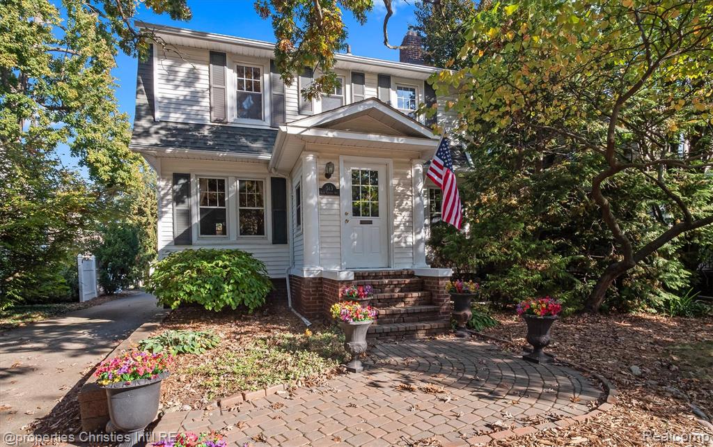 This is a once-in-a-lifetime opportunity to own a once-in-a-lifetime home, ideally located one block from downtown Royal Oak and all of its cafes, shops, restaurants, green spaces, and quaint neighborhood atmosphere.For the first time in over 50 years, this exclusive, historic Royal Oak property is on the market: on the outside, a charming Dutch colonial, and on the inside, a captivating classic that showcases timeless craftsmanship and enduring character.From the expanse of the original wood flooring, detailed coffered ceilings and trim, built-in cabinetry, marble fireplaces, the showpiece staircase, and old-world plaster, you are enveloped in the history of century-old craftsmanship and thoughtful design.Upon entering, you will be stunned by original woodwork throughout. The formal living and dining spaces flow together beautifully, accented by a marble fireplace, antique radio, and vintage fixtures. The kitchen features an ornate tin ceiling, original floor-to-ceiling cabinetry, and a sunny breakfast nook with an original leaded glass china case. Throughout the home are secret closets, surprise panels, and unique built-ins, even in the basement, which includes a meticulously maintained Art Deco terrazzo floor.Upstairs are vaulted hallway ceilings, five bedrooms, including a primary with coved plaster ceilings, and a wood-paneled study with a marble fireplace surround, built-in desk, and cedar closet tucked into the coffered walls. Most enchanting is the crafted shelving that serves as ship-ladder access to a beautifully finished two-room attic retreat.Outside, discover a private yard with ornamental trees and a winding stone pathway leading to an outdoor space featuring a century-old stone wall with a working fireplace and chimney. Beyond the historic masonry is a sun-drenched plot ideal for gardening or peaceful enjoyment.This is a once-in-a-lifetime opportunity to own a once-in-a-lifetime home, one block from downtown Royal Oak and all its charm.