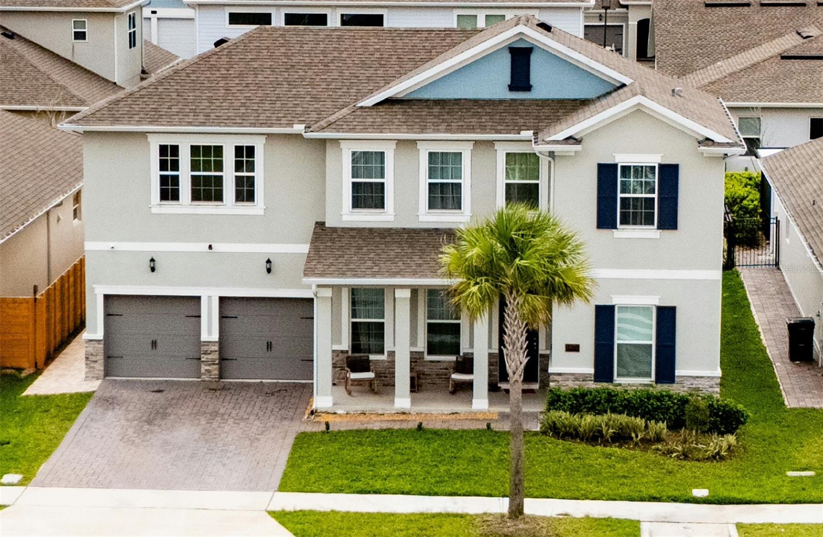 Welcome to elevated living in the highly desirable Lake Nona community—where modern design meets a true resort-style lifestyle.This beautifully upgraded residence offers a functional and elegant layout featuring 5 bedrooms and 3.5+ bathrooms, including a primary suite conveniently located on the first floor for ultimate privacy and comfort.The main level also includes a versatile den—perfect for a home office, flex space, or guest area, along with an additional informal living room, ideal for relaxing or entertaining.Upstairs, you’ll find four additional bedrooms, including one with its own private en-suite bathroom, plus an oversized loft—perfect for a media room, playroom, or second living space.Step inside to a bright, open-concept design with no carpet throughout, complemented by sleek finishes and abundant natural light. The chef-inspired kitchen features an alkaline water system, premium cabinetry, and an expansive island overlooking the main living areas—perfect for entertaining.One of the home’s most impressive features is the expansive triple sliding glass doors that fully pocket into the wall, seamlessly blending indoor and outdoor living while opening to a paver patio and fully fenced backyard for added privacy.Additional upgrades include impact windows, interior alarm system, custom-designed primary closet organization, ceramic finishes in primary bathroom, whole-home water system, epoxy-coated garage floor and modern finishes throughout.Enjoy resort-style living with community amenities including a pool, clubhouse, fitness center, playground, dog park, and scenic lake with dock access.Ideally located just minutes from Lake Nona Medical City, MCO Airport, Boxi Park, SR-417, and the highly anticipated Lake Nona West, offering top-tier shopping, dining, and entertainment.Move-in ready, thoughtfully upgraded, and perfectly designed for modern living—this is the one your buyers have been waiting for!