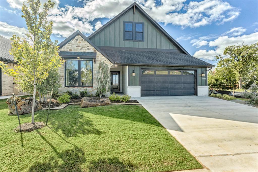 NEVER LIVED IN, BEAUTIFULLY UPGRADED & PRICED BELOW APPRAISED VALUE! This exceptional 2026 home offers 2,713 square feet of thoughtfully designed living space with upscale finishes and custom features you don't always find in new construction. From the striking stone fireplace and soaring ceilings to the decorative wood beams, designer lighting, and gorgeous wood flooring, every detail makes an impression. The stunning kitchen features an oversized island, quartz countertops, beautiful cabinetry, Bosch appliances, and generous storage, opening to inviting living and dining spaces perfect for entertaining. The luxurious primary suite showcases a beautiful wood-accented ceiling, spa-inspired bath, and custom closet. With 3 bedrooms, 3 full baths, a half bath, dedicated office, and spacious upstairs bonus room with built-ins (opt. 4th bedroom), there's flexibility for guests, work, and relaxation. Outside, enjoy a covered patio with a built-in grill and outdoor entertaining space, without the upkeep of a large backyard. Conveniently located in East Edmond near I-35, shopping, and dining. Never occupied, extensively upgraded, at an exceptional pirce-an opportunity to enjoy luxury finishes and generous living space without the wait of building!