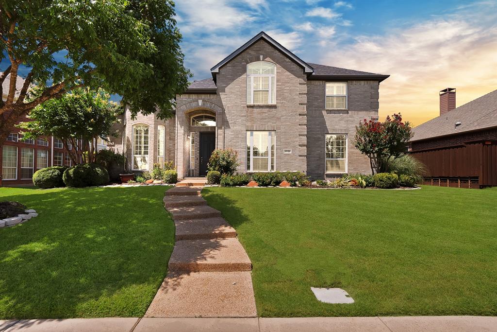 Gorgeous Paul Taylor home in highly sought-after Country Ridge Estates and Wylie ISD! This beautifully designed home offers soaring ceilings, abundant natural light, hand-scraped hardwood floors, plantation shutters throughout, crown molding, and elegant arched entryways. A versatile front flex room is perfect for a home office, study, sitting area, or playroom. The spacious open-concept floor plan is designed for both comfortable living and entertaining, featuring a dramatic floor-to-ceiling Austin stone fireplace in the living room and seamless flow into the kitchen and breakfast area. The chef's kitchen boasts granite countertops, double ovens, extensive counter space, abundant cabinetry, and storage galore. Enjoy both a formal dining room for special occasions and an inviting eat-in kitchen for everyday meals. The private first-floor primary suite offers a relaxing retreat with granite countertops, dual sinks, a separate garden tub and shower, large walk-in closet, and plenty of space to unwind. Upstairs features generously sized secondary bedrooms and a versatile game room that can also serve as an oversized fifth bedroom, media room, or additional living space. Situated on a large lot with a spacious backyard, this exceptional home combines quality craftsmanship, functionality, and timeless style in one of Wylie's most desirable neighborhoods. Don't miss this opportunity to make it yours!