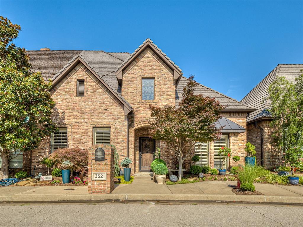 The Grand Foyer with its 20 foot ceilings welcomes you into this magnificent 3 bed/2.5 bath Tudor style townhome, nestled in charming Brookhaven Square. Surrounded by trees,sidewalks and gazebos which makes it perfect for relaxing. The kitchen has been completely updated with new granite countertops on the island and breakfast bar, new built in stainless steel appliances and modern light fixtures.  The downstairs living space features a newly tiled fireplace surrounded by freshly painted built ins. The primary bedroom is located on the main floor which includes  walk in closets and an updated bathroom.   The extra wide staircase leads you to the second living space with endless possibilities, both recently carpeted. Fresh paint and Beautiful crown molding throughout. This home has so much storage and many upgrades. Easy access to schools, shopping and dining and only 13 minutes from OU Campus! Storage is not an issue in this townhome! Schedule your showing today!