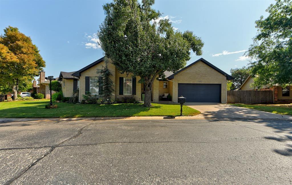 The curb appeal of this home is fabulous! Located in the desirable Arbors/Summerfield community, residents enjoy walking trails that connect to Bluff Creek Park, three community pools, and convenient access to biking trails at Lake Hefner. Major updates include a roof replaced in 2021 and HVAC replaced in 2023!Inside, you’ll find an abundance of windows providing beautiful natural light, along with crown molding and plantation shutters. The cozy living room features wood floors, a ceiling fan, fireplace with gas logs, crown molding, and plantation shutters. The updated kitchen offers granite countertops, stainless steel appliances, crown molding, a built-in hutch, and a refrigerator that stays. You’ll love the spacious utility room with built-in desk and storage.The primary bedroom features crown molding and convenient access to a versatile flex room, perfect for a home office, workout space, or additional living area. The primary bath includes a walk-in closet, separate shower, whirlpool tub, large vanity with two sinks, and makeup vanity. The second bedroom features a ceiling fan and crown molding, while the hall bath offers a tub. The third bedroom includes glass doors and built-in bookcases, making it an ideal bedroom or home office.  The backyard is perfect for relaxing or entertaining, complete with a hot tub and covered patio for enjoying peaceful evenings outdoors. Sprinkler system and security system are included. You can’t beat this location with easy access to shopping, dining, Lake Hefner Parkway, and all that the surrounding area has to offer!