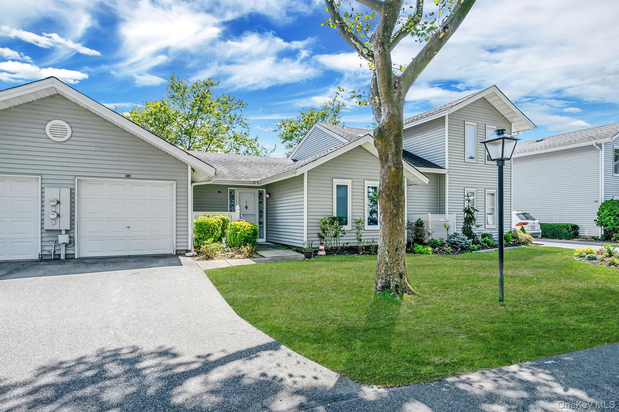 Beautifully updated 2-bed, 2-bath ranch-style condo in a highly sought-after 55+ community. Immaculately maintained with a bright, open layout, primary bedroom with large en-suite and closet.  Second bedroom, full bathroom, large hallway closet and a laundry/utility room for convenience. This community offers an array of amenities including a clubhouse, tennis courts, two outdoor pools, a fitness center, an indoor pool, a library and a blliards room. As a community resident, you also have access to bus service for shopping. Conveniently located near the Smithaven Mall, restaurants, movie theatre and other convenient businesses. Min age, 55.