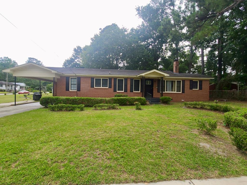 Great investment or owner-occupant opportunity in Thomasville! Situated on a spacious 0.61-acre corner lot, 606 Magnolia Street offers 5 bedrooms and 2 bathrooms with plenty of potential to renovate, refresh, and make it your own. The fifth bedroom provides flexible use as an office, guest room, hobby space, or additional living area. This brick home offers solid bones, generous yard space, and room to enhance the property with outdoor living, gardening, parking, or future improvements, subject to local zoning and approval.  A standout feature is the double-room, brick-finished utility building located out back, offering excellent storage, workshop potential, or additional functional space. The property is conveniently located near Thomasville City Schools, Downtown Thomasville shopping and dining, Cherokee Lake Park, the Thomasville Rose Garden, local restaurants, and everyday conveniences.  Bring your vision and unlock the potential of this fixer-upper. Whether you are an investor looking for your next project or a buyer wanting space, location, and long-term value, this property offers a strong opportunity on a desirable corner lot in Thomasville.