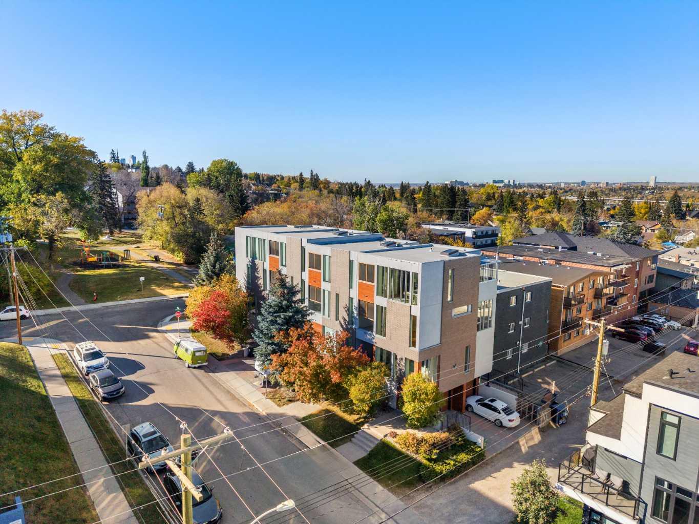 Welcome to 1712 – 19 Avenue SW, an impeccably maintained CORNER-UNIT TOWNHOME offering 1,956 SQ FT OF SOPHISTICATED LIVING SPACE across three levels in the vibrant inner-city community of BANKVIEW. Designed with a perfect balance of contemporary elegance and functionality, this residence combines modern architectural details with warm, inviting interiors—just steps from the shops, dining, and energy of 17th Avenue.
Step inside and be welcomed by an airy, open floor plan with 9' TALL HIGH CEILINGS THROUGHOUT and expansive windows that flood the home with natural light. A striking OPEN RISER STAIRCASE FRAMED WITH GLASS RAILING and rich walnut hardwood floors lead you into the bright living area, where a sleek METAL-FRAMED GAS FIREPLACE creates the perfect focal point. The CHEF-INSPIRED KITCHEN features QUARTZ COUNTERTOPS, custom cabinetry, stainless steel appliances, gas cooktop and a generous island ideal for cooking and entertaining. Just off the dining area, a private balcony with a GAS LINE HOOKUP extends your living space outdoors, perfect for summer BBQs.
The second level offers two spacious bedrooms and a beautifully appointed full bathroom with DUAL VANITIES, A DEEP SOAKER TUB, AND A GLASS ENCLOSED SHOWER. A conveniently located upper laundry room adds everyday functionality to this level.
The PRIMARY SUITE spans the top floor, offering a true retreat. With FLOOR-TO-CEILING WINDOWS, a private balcony, and a large walk-in closet, this space combines luxury with privacy. The spa-inspired ensuite is a showstopper, featuring dual vessel sinks, a walk-in glass shower, and elegant finishes that make it the perfect place to unwind.
The lower level of the home offers practical storage space and direct access to the SINGLE ATTACHED GARAGE with FULL DRIVEWAY, providing both security and convenience. As an END-UNIT, this property benefits from additional natural light and a heightened sense of privacy, enhancing the overall living experience.
Located in ONE OF CALGARY'S MOST SOUGHT-AFTER INNER-CITY NEIGHBOURHOOD, this townhome is within walking distance of 17th Avenue, Marda Loop, coffee shops, restaurants, parks, and public transit. Quick access to major routes also makes commuting downtown or exploring the city a breeze.
This stunning residence delivers the BEST OF MODERN INNER-CITY LIVING—contemporary architecture, luxurious finishes, and unbeatable walkability—all wrapped into one exceptional home. Schedule your private showing today to experience 1712 – 19 Avenue SW for yourself.