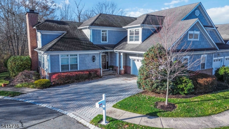 Discover exceptional privacy in this sun drenched upscale townhome located in the desirable Green Village section of Chatham Township. Nestled on a quiet cul-de-sac within the highly sought-after 55+ Melrose community, this residence offers a rare combination of tranquility and convenience.Boasting over 3,800 square feet of beautifully finished living space, the home provides generous room for comfortable everyday living as well as effortless entertaining. Ideally situated within this intimate community, the townhome occupies one of the most desirable locations set on a cul-de-sac and backing to private wooded views, offering exceptional privacy with no direct views of neighboring homes or buildings.The home offers a highly desirable first-floor primary suite with an ensuite bath and 2 walk-in closets. Also on the first floor is an eat in kitchen, open to the family room and dining room. The main floor hosts the office, mudroom laundry room and powder room too. The two car garage enters into the home and is located on grade! A very private deck overlooks the woods - a perfect space to relax, grill and enjoy the outdoors. The second level offers 2 bedrooms, 2 full baths, an office, and den with gas fireplace. The office could be used as a 4th bedroom if needed. The full unfinished basement is exceptionally large with high ceilings -ready for storage or can be finished down the line for additional living space.