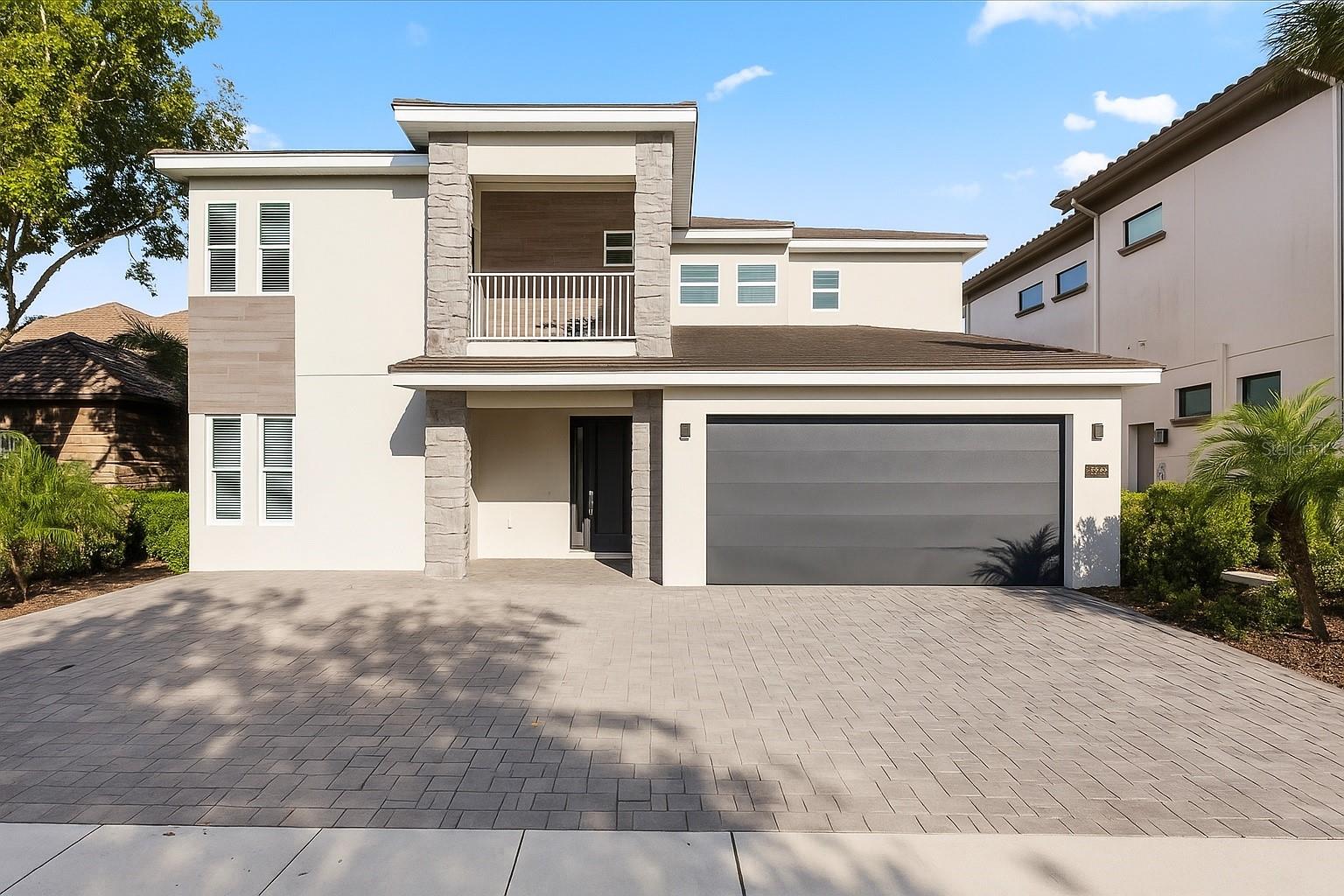 Welcome to your Ultimate Dream Retreat in Reunion Resort! Experience luxury and entertainment in this turnkey vacation rental property. This beautiful modern 10-bedroom, 9.5-bath masterpiece every detail was designed for comfort, style, and unforgettable experiences.

The open-concept living area features elegant leather seating, striking wall art, and a gourmet chef’s kitchen with double appliances—two stoves, refrigerators, dishwashers, and microwaves. Dine in style at the grand table for twelve or relax at the sleek wet bar nearby.

Step outside to your private resort-style oasis with an extended patio, luxury cabanas, outdoor kitchen, dining area, smart TV, and a heated spillover spa. End your evenings by the fire pit under the stars.

Inside, entertainment awaits with a high-tech game room, movie theater with leather recliners and 150” screen, and themed bedrooms that transport guests to outer space or Jurassic adventures. Each of the remaining bedrooms offers elegant finishes and peaceful comfort.

With smart-home features, security system, and dual laundry areas, this property blends convenience with sophistication.  
The property is located in one of the best locations in the area. Minutes from Disney world and other attractions plus various shopping and restaurant options are close by.  Don't miss out on this opportunity have your Realtor make an appointment to schedule your private tour today and discover one of Reunion Resort’s premier luxury homes!  **Transferable Membership**