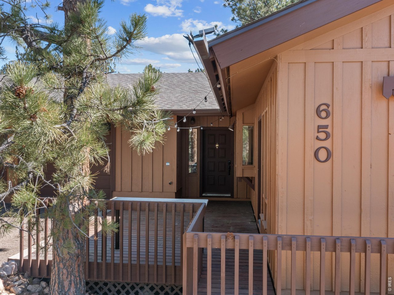 650 Freeland Ct, Estes Park, CO, Location, Views & Endless Potential in the Heart of the Rockies. In the Stanley Hill neighborhood, near the Historic Stanley Hotel, this home is a gem, w/ breathtaking mountain views, generous space, & unbeatable walkability. Positioned on a nice cul-de-sac off Steamer Dr, the Snow-Capped Peaks of Rocky Mountain National Park fill your windows & steal the show: There's Flattop Mountain, Hallet's Peak, Otis, Taylor. & there's Longs Peak! The wrap-around deck views are best & it would be easy to expand the deck for even more fantastic views. There's lots of room to stretch out, w/ abundant square footage & flexible layout ready to fit your vision. 3 BRs & an additional room that could be a rec room, music room, yoga & workout space. W/ ample living space & room to expand or reimagine, this home is ideal for buyers seeking value-add potential. There's a workshop space in the lower level & a big garage. The property's location offers a great opportunity for walkability-just minutes from downtown shops, restaurants, & everyday conveniences. The Lake Trail is just down the hill. Walk to Notchtop Cafe or Mtn Home Cafe for breakfast/lunch, then over to the Post for dinner. Leave the car behind & explore Estes on foot. And Lumpy Ridge trailhead is just over the hill! You'll be perfectly positioned to enjoy events at the Stanley Hotel & the upcoming Stanley Event Center, which will be "a year-round hub for film, art, & community." The big fireplace in the dining room sets the tone for cozy winter nights, the whole house fan will keep you cool in the summer, and the deck is where you'll grill and watch the sunsets paint the sky in amazing colors. Sweeping mountain views that never get old capture the natural beauty of the surrounding peaks and open skies. If you've been waiting for a place with views, vibe, and vision... check out Freeland Ct.