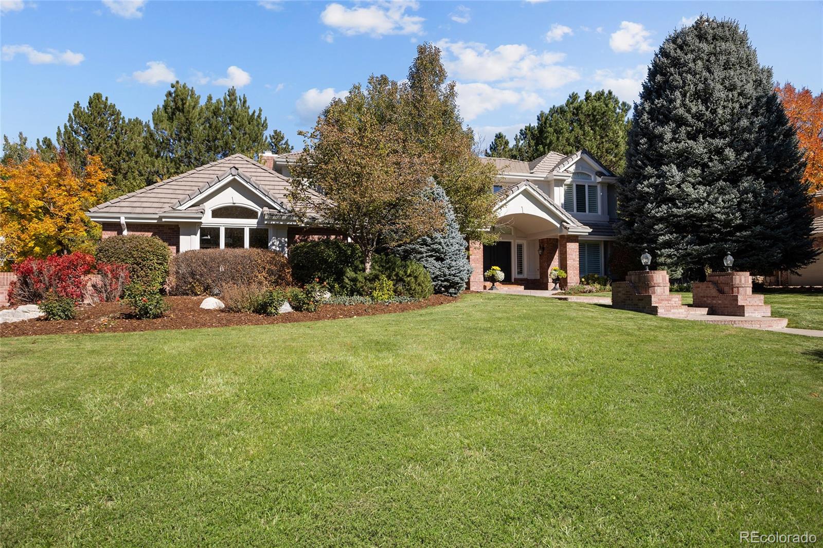Welcome to this stunning-remodeled home, located within the Cherry Creek School District. Set on a beautiful, private, treed lot. This home offers privacy, timeless updates, a perfect blend of elegance, comfort and every day livability. You are greeted by a grand, open foyer featuring dramatic high ceilings. The foyer leads right into the main-level living area with an intuitively designed layout providing a seamless flow from room to room. A private study with custom built-ins provides perfect space for home office. The formal living room with fireplace creates a setting for entertaining. Adjacent, is the elegant dining room. Beautiful decorative wall and ceiling molding throughout. The kitchen with island, informal eating space flows seamlessly into the great room with soaring ceiling, wall of windows, second fireplace shape the heart of the home with direct access to outdoor living. The sun room brings in abundant  light and offers a serene space to relax. The spacious primary suite complete with private deck overlooks the grounds. 3 additional bedrooms each with its own en-suite baths provide comfort and privacy. Lower level has built-in bar, refrigerator flexible space for theatre, workout room, another living area, private guest suite/bath. Some of the many updates include: Windows, AC, Radon Mitigation, Carpet, Hardwood Floors. Backyard oasis includes built-in BBQ, Fire Pit and Sport Court making it  an entertainer's dream and family sanctuary. Living in the Preserve is a true Colorado lifestyle. Walking trails, parks, pool, tennis, clubhouse, plus quick access to DTC, downtown Denver. This location offers a sense of strong community, tranquility and convenience. An exceptional home in a premiere setting!