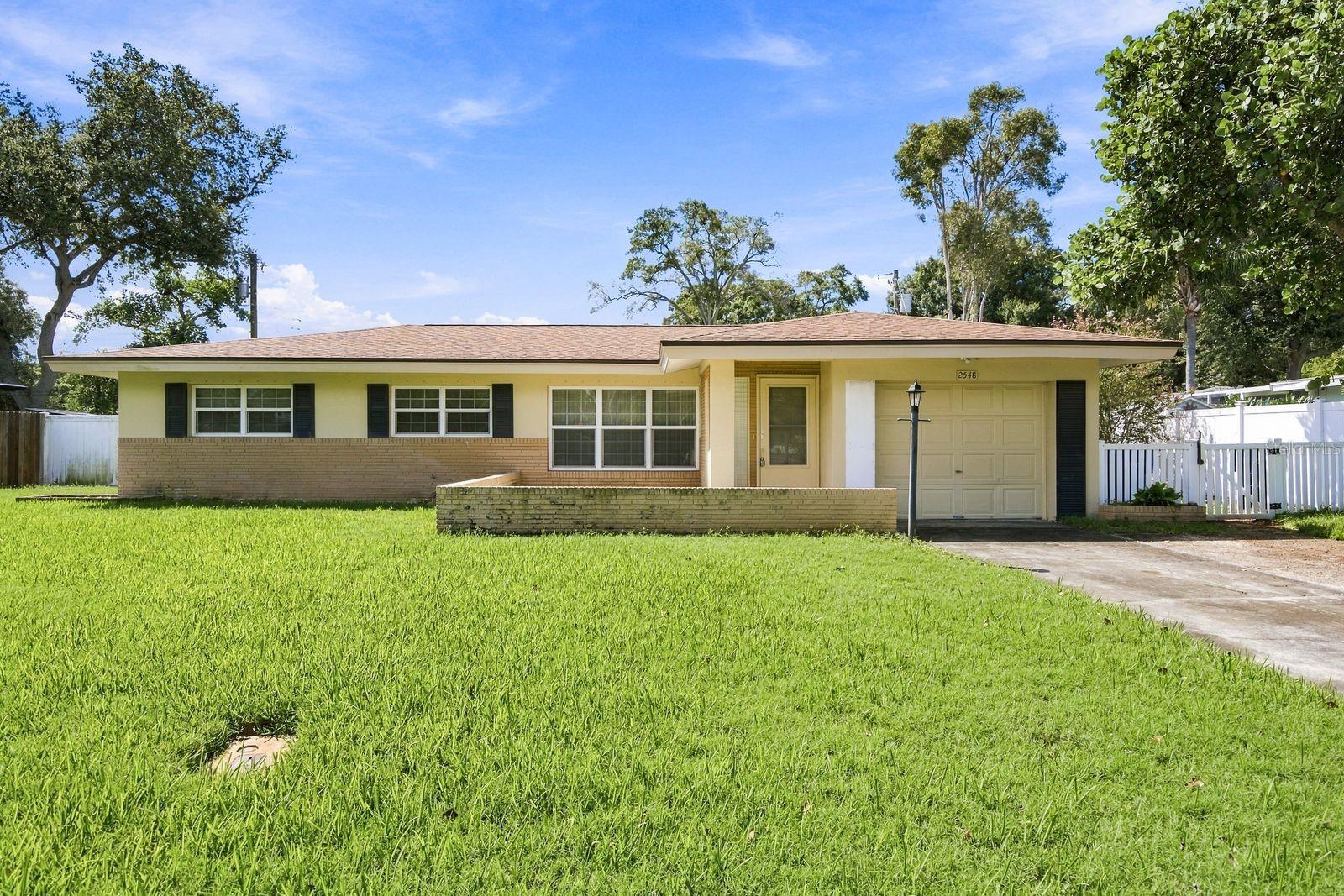 Welcome to this charming, clean, and very well-maintained three-bedroom, two-and-a-half-bathroom home in Largo! Recent updates include a 2023 AC, 2020 roof, 2024 pool pump, and 2023 electrical updates, providing added peace of mind. Offering a comfortable layout with plenty of living space, this home features a spacious living room and dining room combination that opens to the family room with a wood-burning fireplace. The kitchen has a convenient breakfast nook and, nearby, a welcoming den that provides additional living or entertaining space. The primary bedroom includes a walk-in closet and private bathroom, while a dedicated laundry room adds everyday convenience. The backyard offers a wonderful setting to enjoy the Florida lifestyle. The private pool is surrounded by a fully fenced backyard with plenty of space to relax and entertain. A covered outdoor dining area creates the perfect spot for morning coffee, al fresco meals, or gathering with friends and family, while the pool provides a refreshing retreat on warm Florida days. Whether you're enjoying a quiet afternoon outside or hosting a weekend pool gathering, this backyard offers a great extension of the home's living space. Conveniently located near parks, the Largo Sports Complex, and E Bay Drive, with plenty of dining and shopping options nearby. Beautiful Belleair Beach is less than 20 minutes away, making it easy to enjoy Gulf beaches, sunshine, and everything the Florida lifestyle has to offer. This well-cared-for home offers a wonderful combination of comfort, outdoor living, and a convenient Largo location.