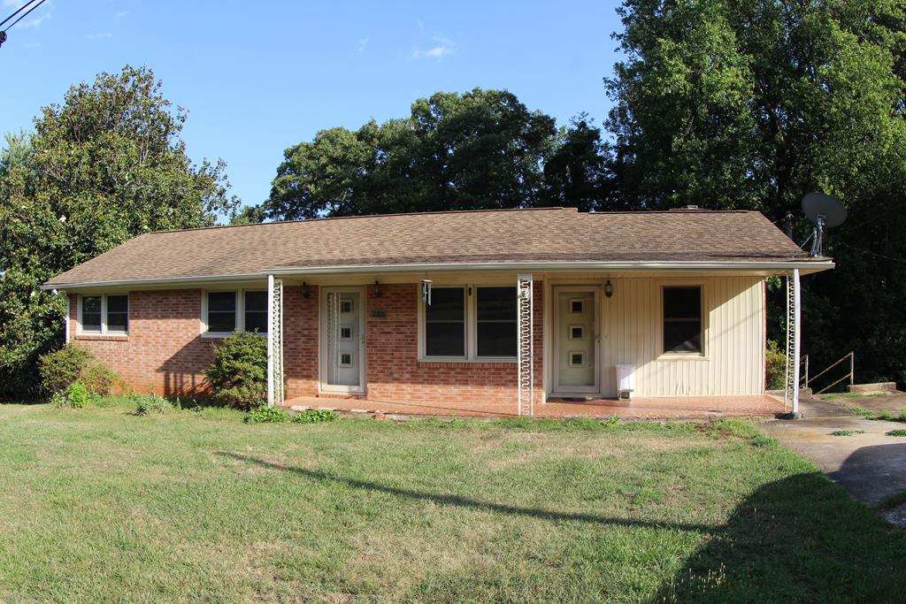 Brick ranch-style home located in the Town of Stuart, VA. Situated on approximately 0.3 acres , this property offers an opportunity for buyers, investors, or anyone looking to renovate and create a home tailored to their vision. The main level features a den, living room, kitchen and dining combination, three bedrooms, and a full bathroom. The home also includes a full unfinished basement providing additional space for storage, a workshop, or future expansion. Plumbing has already been installed for a future bathroom, with a section of the basement set aside for this potential addition.  This property is being sold as a fixer-upper and will require TLC, but it offers solid brick construction and excellent possibilities. Conveniently located near local restaurants, churches, schools, banks, and the library, this home provides a great opportunity to invest in a property with character and potential.   Property is being sold as is! Seller will not do any repairs.  25 Minutes to Martinsville, VA. 40 minutes to Floyd, VA.  40 minutes to Mt. Airy, NC