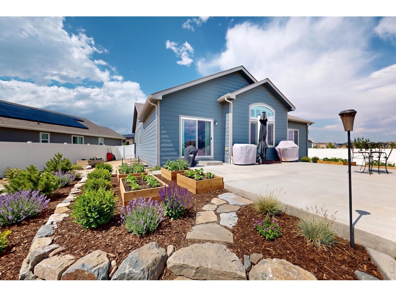 JUST REDUCED AND PRICED TO SELL! This beautifully designed 4-bedroom, 3-bath ranch-style home offers the perfect blend of flexibility, comfort & function in a great neighborhood.Set on a huge 1/3-acre lot with endless potential, inviting you to create the backyard oasis you've always imagined.From the moment you enter, the home feels warm and welcoming.The expansive great room features natural light & vaulted ceilings, flowing effortlessly into the chef's kitchen to create an open setting ideal for everyday living.The kitchen serves as the heart of the home with a generous quartz center island, abundant cabinetry, a walk-in pantry, keeping family and guests connected.Plantation shutters and recent interior paint add a polished finishing touch.The main-level primary suite retreat is highlighted by a recently remodeled primary bathroom with gorgeous large-format tile flooring, dual-head shower, double vanity, soaking tub, & dual fireplace! The main level also includes a formal dining room and a separate bedroom with the ability to create an en-suite option, making it ideal for multigenerational living.The finished lower level adds exceptional value and versatility for extended guests or independent living. Complete with a full kitchen, two additional large bedrooms, a full bathroom, and a spacious recreation area, the space is ready for a media room, game room, home office, fitness area, or separate living quarters. Outdoor living continues on the extended patio with walkway, offering the perfect place to relax and enjoy the expansive backyard with room to grow, gather, and design your own outdoor escape. An attached three-car garage provides excellent storage and space for vehicles and recreational gear.Ideally central to Windsor, Timnath, and Fort Collins, this home offers quick access to shopping, dining, schools, parks, walking and biking trails, Boardwalk Park at Windsor Lake, the Poudre River Trail, and nearby golf courses including Harmony Golf Course.