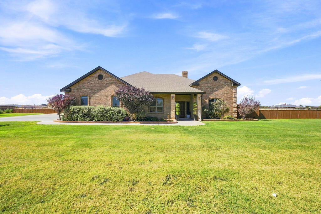 4 BED, 2 BATH, 2 CAR GARAGE CUSTOM-BUILT HOME SITTING ON 1.5 ACRES! BEAUTIFUL CURB APPEAL WITH AUSTIN STONE ACCENTS, LARGE DRIVEWAY LEADING TO THE 25X30 SHOP & 2-CAR GARAGE! INSIDE, ENJOY WOOD FLOORING IN THE LIVING AREA WITH A GRAND AUSTIN STONE FIREPLACE & PLENTY OF NATURAL LIGHT. GREAT KITCHEN WITH CUSTOM CABINETRY & PLENTY OF SPACE FOR ENTERTAINING! SPACIOUS BEDROOMS PERFECT FOR GUESTS OR FAMILY, OFFICE SPACE & LARGE BATHROOMS! BIG BACKYARD WITH COVERED PATIO & FIRE PIT! LOCATED IN OAKRIDGE ADDITION, LESS THAN TWO MILES FROM GISD! MUST SEE!! NEW 1.5 HP SUBMERSIBLE PUMP  DEC. 2025