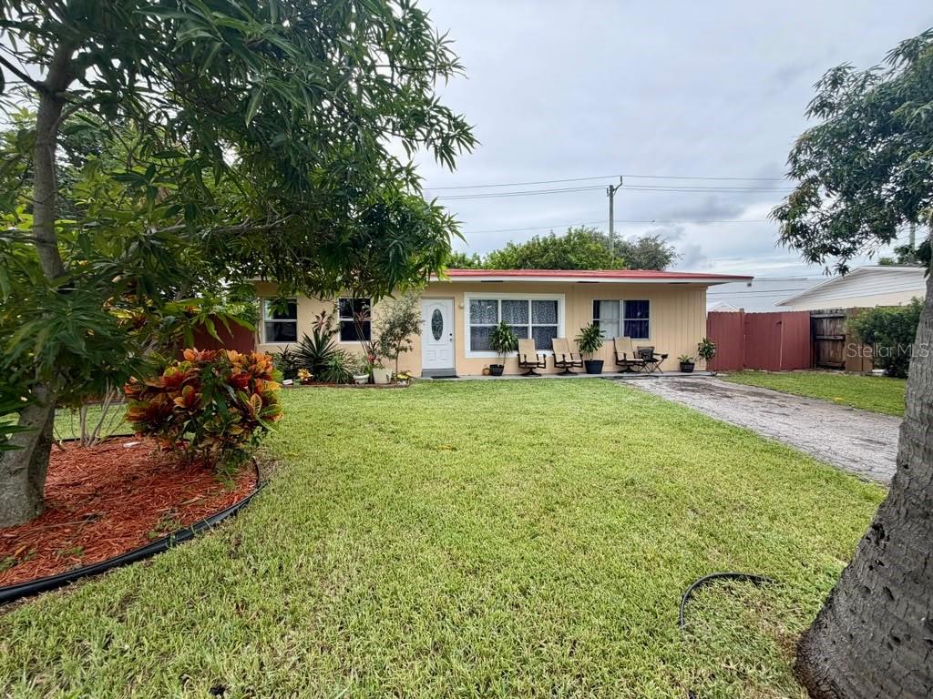Welcome to this charming single-family home in the heart of Cresthaven, Pompano Beach! Lovingly maintained by the same owner for over 30 years, this solid CBS home features a NEW ROOF (2021), central A/C, tile flooring throughout, and a versatile Florida room perfect for a home office or den. Enjoy morning sun on the front patio, a fully fenced yard with a mature mango tree, and plenty of room to add a pool. NO HOA — no fees, no rental restrictions, bring your boat or work truck! Located in Flood Zone X (no flood insurance required), on public water & sewer. Washer and dryer included. Minutes to I-95, the Turnpike, beaches, shopping, and Pompano's booming downtown. Perfect for first-time buyers or investors — homes with new roofs at this price point don't last. Schedule your showing today!