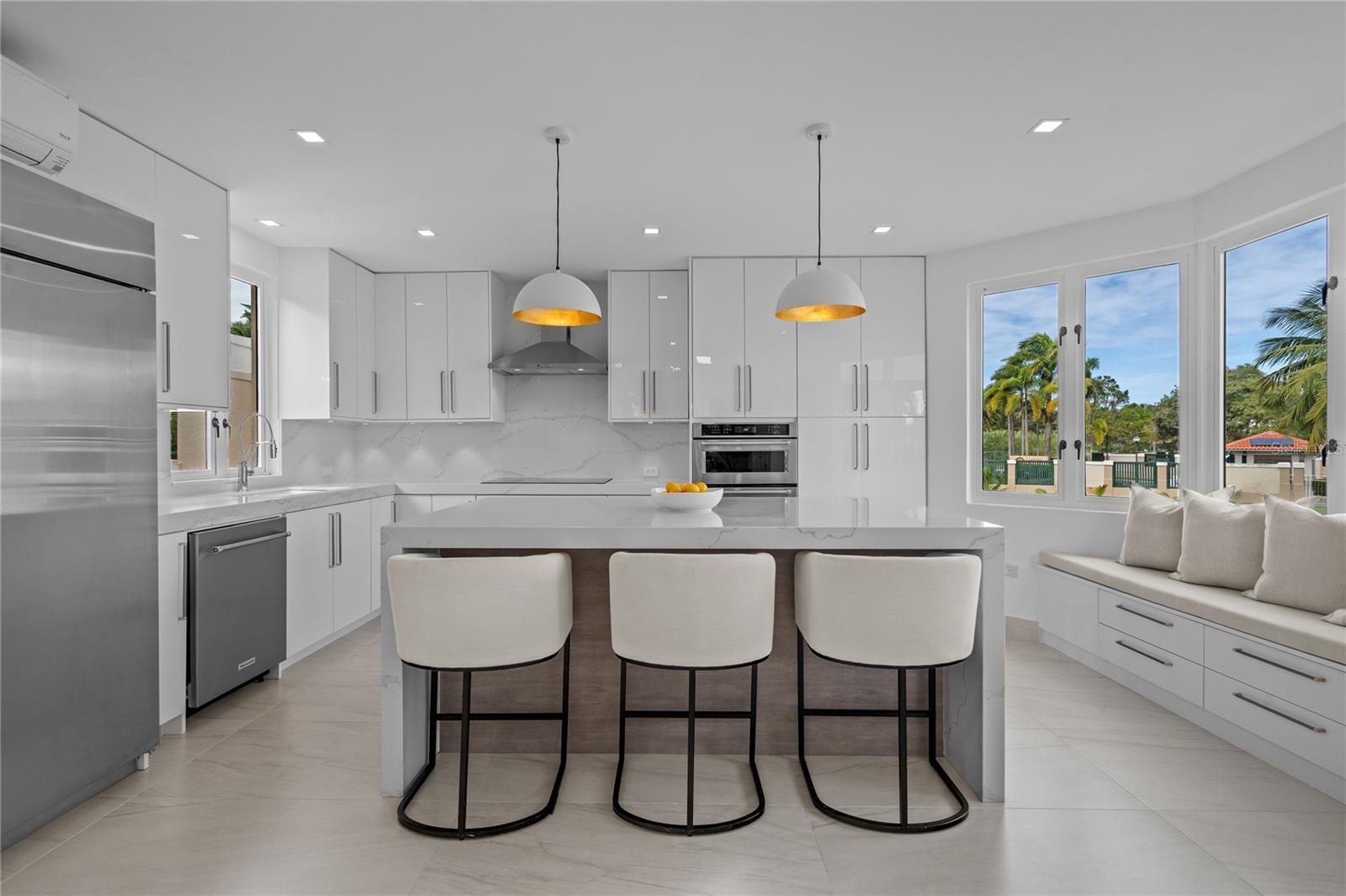 THE ONLY DETACHED VILLA - 100% GUT-RENOVATED - NYC-LEVEL FINISHES - LAKESIDE VILLAS. UNPRECEDENTED PRIVACY & LIGHT:  Welcome to the "Unicorn" of Lakeside Villas. This is the ONLY building in the community that stands alone, meaning ZERO shared walls. This architectural advantage floods the home with natural light from additional windows that other units simply do not have. Tucked in a secluded corner with virtually no traffic, it offers the privacy of a single-family estate with the convenience of a condo. METROPOLITAN LUXURY: Forget "island time" renovations. This residence has completed a meticulous, multi-year gut renovation where absolutely nothing original remains. Designed for the buyer accustomed to NYC or LA standards, this home features exquisite stone surfaces, custom cabinetry, and high-end furniture. THE VIEW: The living area and terrace overlook a massive lake where the central fountain lights up at night, creating a sophisticated backdrop for evening cocktails. COMMUNITY & AMENITIES: One of 3 pools is directly outside your door. Enjoy 2 lighted tennis courts, pickleball, gym, playground, and the secluded sandy beach. Located just over the Dorado line, you are minutes from the Ritz-Carlton Reserve but EXEMPT from the 1% Dorado Transfer Tax. TURNKEY PERFECTION: If you are tired of "updated" listings that still need work, this is your answer. Flawless. Private. Done.
