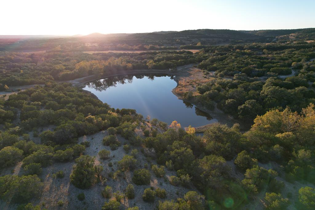 Discover the beauty of Texas Hill Country with this stunning 177-acre property in Blanco, TX. Includes 2 Ponds and one being  a 3-acre spring-fed stocked pond, diverse wildlife, and panoramic views, this land at 6470 Rocky Road offers a perfect blend of tranquility and convenience, just minutes from downtown Blanco. Enjoy the benefits of an agricultural exemption and a mostly fenced perimeter, ready for you to enjoy.