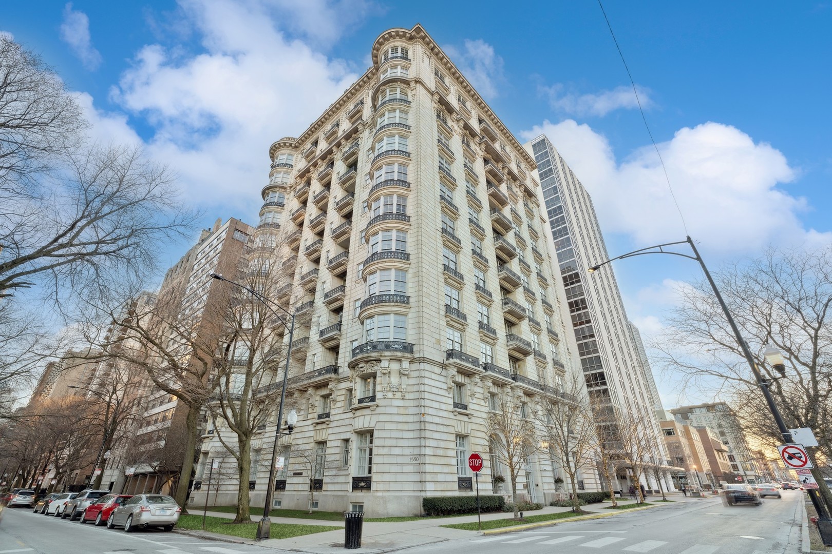 Experience the pinnacle of luxury living in this stately 8,500+ Sq.Ft. residence at the prestigious Benjamin Marshall's Beaux Arts building. Situated in the desirable Gold Coast neighborhood and boasting breathtaking views of the South end of Lincoln Park, this magnificent one-of-a-kind home has been seamlessly combined exuding elegance and functionality. Enjoy a spacious open floorplan designed for both sophisticated entertaining and comfortable family living with abundant windows on three sides bathing the space in natural light. This exquisite home occupies the entire north side and east side of the building, spanning 80 feet of frontage and ensuring optimal park and State Parkway views, as well as offers exclusive privacy as the sole residence on the floor. With high ceilings, exquisitely appointed finishes and meticulous millwork throughout, every detail has been carefully considered. Indulge in grand living spaces, from the opulent living room and elegant dining room to the gourmet kitchen, expansive great room, convenient catering kitchen and even a billiards room, all thoughtfully designed and appointed. The chef's kitchen is a culinary delight, featuring dazzling white cabinetry, premium Sub-zero and Wolf appliances, a sizable stone center island and a beautiful breakfast nook. The primary suite is a true sanctuary featuring exquisite dual white marble baths, generous walk-in closets, and a quaint sitting room. There is an additional en-suite bedroom with walk-in closet and marble bath. The lower floor of this exceptional residence presents a myriad of opportunities offering an expansive recreational room, a spacious media room, grand office space and multiple bedrooms with stunning baths. This remarkable home offers abundant space and unrivaled potential for single family living in Gold Coast's most premier service-oriented building. Additional highlights include in-unit laundry and access to a full-service building with a 24-hour doorman, wine storage, a fitness center, and a guest suite. Perfectly located steps away from the park, lake, Latin School of Chicago, restaurants, entertainment and so much more.