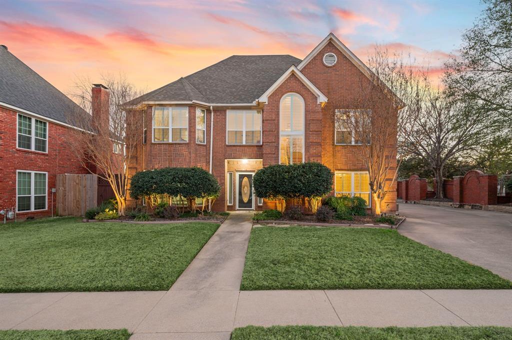 Beautifully updated and meticulously maintained, this stunning two-story home sits on a coveted corner lot in the prestigious Willow Creek community of Bedford. Thoughtfully designed, this home features four spacious bedrooms, three and a half baths, and a private home office ideal for remote work, study, or a quiet retreat. Step inside to an open-concept living space anchored by a cozy fireplace and an abundance of natural light streaming through walls of windows that were replaced in 2023. The chef’s kitchen is both stylish and functional, showcasing granite countertops, timeless white cabinetry, stainless steel appliances, and a generous walk-in pantry, perfect for everyday living and entertaining alike. The expansive primary suite offers a serene escape with a spa-inspired ensuite, remodeled in 2024, features a luxurious freestanding soaking tub, oversized walk-in shower, designer cabinetry, quartz countertops, and upscale lighting finishes. Step outside to a true backyard retreat, where a heated diving pool and spa are surrounded by mature landscaping and an updated wood privacy fence, creating the perfect setting for relaxation or hosting guests year-round. Additional highlights include the home’s location on the power grid, offering added peace of mind during outages. Ideally situated near premier shopping, dining, and entertainment, with convenient access to DFW International Airport, this exceptional home blends comfort, style, and an unbeatable location.