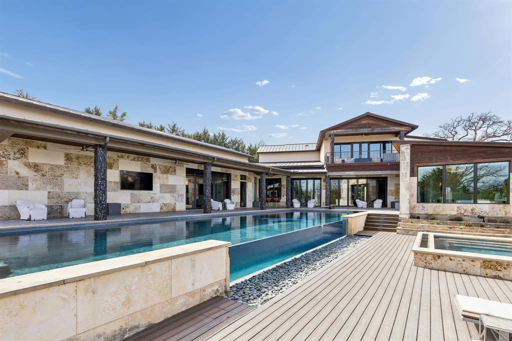 Welcome Home to this spectacular, one-of-a kind Custom home designed for effortless indoor-outdoor living!!! Located in Westlake's coveted Vaquero subdivision, with a Vaquero GOLF membership!!! This exquisite home was built with the highest level of craftsmanship and style by Cory Van Trease. This architecturally stunning masterpiece is a perfect blend of modern, open plan design with timeless elegance. Impressive details wow throughout with exposed beams, custom chandeliers, wood accent paneling and walls of windows and accordion doors for seamless connection with the backyard oasis. As you enter, you are welcomed with a tranquil reflecting pool with a gorgeous modern sculpture. Walk into the large and inviting Great Room with a wood paneled feature wall and 4 fire features, plus a full wall of retractable glass doors. Walk to the large Dining room with custom banquette and then to the gorgeous Chef's Kitchen with top-of-the-line Wolf range, ovens, warming drawer, Subzero fridge-freezer & exquisite Crystallo quartzite countertops. Everyone will enjoy the spacious downstairs Game & Media rooms. Retreat to the private Master Suite sanctuary from the day to enjoy perfect views of the outdoor oasis. The Spa Bath impresses with luxurious bath, dual vanities, steam shower + 2 separate closets. Private Guest Suite and impressive Executive Study are down. Upstairs boasts 3 private Bedroom suites + a Game Room with balcony overlooking the pool area. Discover a true Backyard Oasis with its incredible pool & infinity glass wall, separate spa, fire and water features, plus a spacious Cabana featuring a hibachi grill, pizza oven & bar with ample seating. A fire pit & custom heaters provide warmth & ambiance. Golf enthusiasts can work on their game at the outdoor putting green.  ** Sellers are willing to earmark their Full Vaquero Golf Membership to the Buyers **. Buyers must complete Vaquero membership process, be approved and pay all Club fees directly to the Vaquero Club. ***