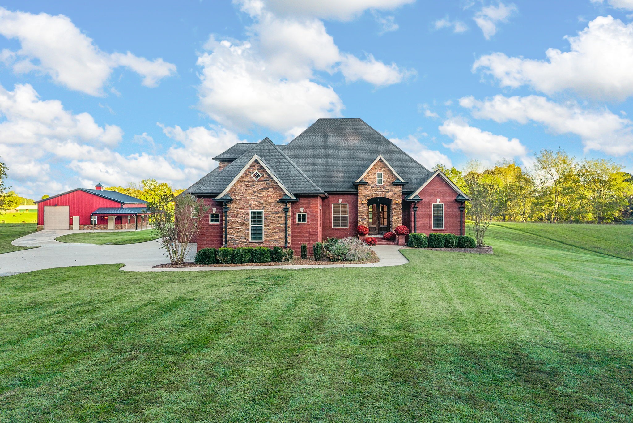 WOW. Truly a standout — this custom all-brick ranch speaks for itself, perfectly nestled on 5.78 private acres and dressed to impress with refined finishes throughout, designed for versatility and comfort. Complementing the home are a 40x50 building with 12-foot garage doors and a 30x32 structure with 8-foot doors(sauna, swim spa & hot tub conveys!) — ideal for car collectors, boaters, hobbyists, or elevated storage solutions. Freshly painted & turn key ready with 4 bedrooms, open concept living room & chefs kitchen, spacious bonus room, 3 full baths & 2 half, this house is the perfect entertaining home that you must see!