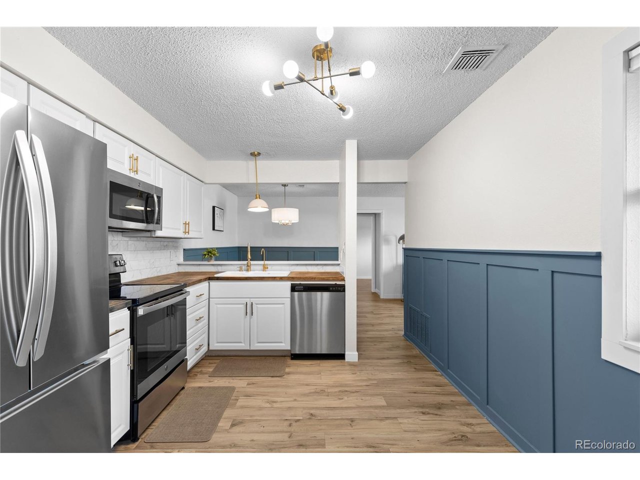 Welcome to 2330 E Fremont Avenue #K19, a beautifully updated ground-level condo in the desirable Southglenn Commons low-maintenance living in the heart of Centennial. With 1 bedroom, 1 bathroom, and 806 square feet, this move-in-ready home is an excellent opportunity for first-time buyers, downsizers, or investors alike.Inside, you'll find a bright and inviting open layout featuring updated flooring, fresh paint, modern lighting, and stylish finishes throughout. The spacious living and dining areas flow seamlessly together, creating a warm and welcoming atmosphere for everyday living or entertaining. The updated kitchen includes stainless steel appliances, refreshed cabinetry, and generous counter space, while the renovated bathroom offers a clean, contemporary feel. A convenient all-in-one washer/dryer is located inside the unit, and with no interior stairs, this ground-floor home provides easy accessibility and everyday comfort.One of the standout features of this property is the exceptional HOA coverage, which includes gas/heat, water, sewer, trash, snow removal, exterior maintenance, building insurance, and access to the community pool, clubhouse, and beautifully maintained open spaces...making for truly carefree living. Ideally located just steps from the pool and clubhouse, the unit also includes a private storage closet near the front entry.Surrounded by greenbelts and parks and just minutes from The Streets at SouthGlenn, Cherry Knolls Park, and DeKoevend Park, this location offers easy access to shopping, dining, entertainment, Whole Foods, library services, and everyday conveniences. With quick access to major highways and the greater Denver metro area, this home combines updated style, practical amenities, and an unbeatable Centennial location.