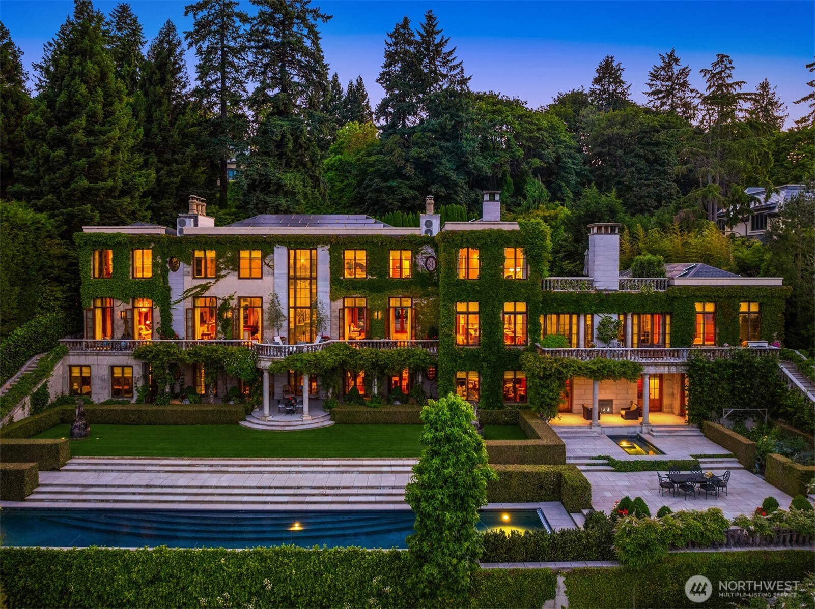 Characterized by timeless European elegance, this exceptional residence reflects refined Georgian sensibility with a deep respect for scale, proportion, and rich, enduring materials, yet functions flawlessly with regard to livability and daily enjoyment. Situated on the shores of Lake Washington, the lake, mountain & skyline panorama beckons from every room, terrace and garden. Tall symmetrical windows, 12 fireplaces, superb craftsmanship, gracious rooms with excellent flow, and inviting spaces. Seamless indoor-outdoor living offers a rare 160 ft natural pebble beach, boat dock, enchanting lakeside garden pavilion, swimming pool, spa, and entertainment terraces. Sustainable Geothermal and Photovoltaic systems. PLS SEE PHENOMENAL VIDEO