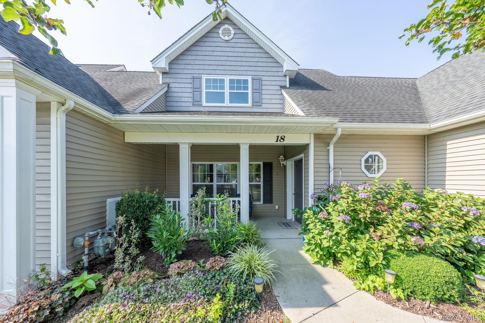 Welcome to Stoneleigh Woods, Riverhead’s premier 55+ gated community. This beautifully spacious Birch model boasts 2,172 sq. feet and has a premium location on a quiet cul-de-sac. Inside, you’ll find 2 bedrooms, 2.5 baths, plus a versatile loft area that’s perfect for an office, guest space, or den. The main level primary suite includes a large closet and ensuite bath for easy first-floor living. A modern kitchen with granite countertops, stainless steel appliances, and abundant cabinetry opens seamlessly to the dining and living areas. The living room features a beautiful gas fireplace with a brick facade, creating a warm and inviting centerpiece. Large windows provide plenty of natural light throughout the home. Residents of Stoneleigh Woods enjoy a full suite of amenities: a heated pool, clubhouse with fitness center, game room, and social spaces, plus beautifully maintained grounds. HOA covers exterior maintenance, lawn care, and snow removal—so you can simply relax.