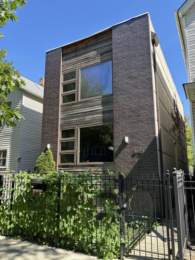 This 4bed/4bath Logan Square house has a lot to offer.    Open-concept for living-dining-kitchen area.  Kitchen has custom designed cabinets, granite, island, SS appliances etc.  Bathrooms have granite, marble etc. Modern, sleek looking, floating staircases are a nice touch. Enormous, finished basement has a full bathroom, very high ceilings & limitless possibilities.  This house has great bones but does need some light rehab, updating & TLC, hence the discounted price.  Carpet removed on the 2nd level subsequently, buyer can choose their own flooring now.  House has a backyard & 2.5 car garage. (2800sf of living space includes finished basement)