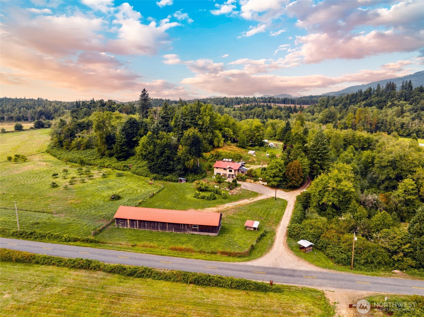 Rare opportunity to own 136 acres of highly versatile farmland in prime Mt. Vernon location. This exceptional 4 parcel property is perfectly suited for a self-sustaining lifestyle, offering a 3 bed, 2 bath home with attached 2 bed one bath ADU, huge shop with 7 bays of covered parking, an 80x100 barn with retired milking suite, original farmhouse shed, smokehouse and 2 potential building sites. Enjoy natural spring water, fertile ground for hay, cattle, or organic crops, and abundant timber for lumber and heat. Natural rock on site provides the resources to build and maintain roads. With open pastures, rolling terrain, and wooded areas, the land offers endless possibilities to create your ideal working farm or homestead.