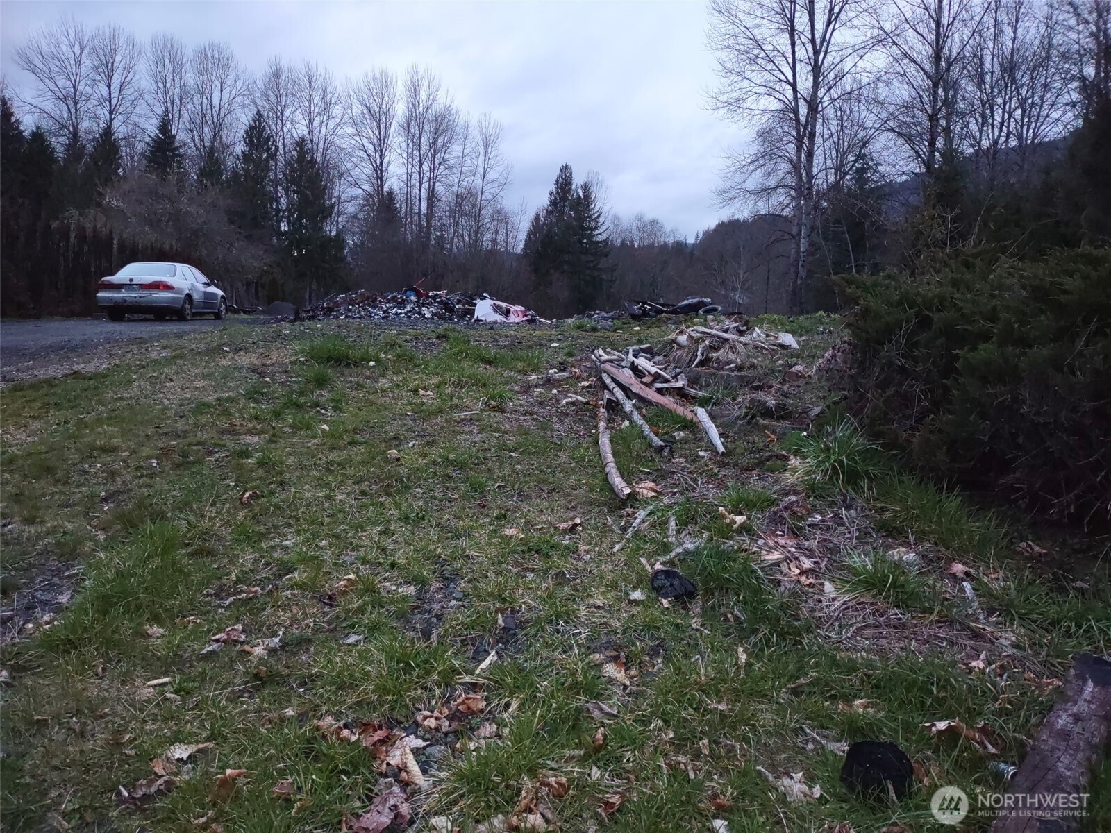 Beautiful Serene Views less than an hour from Mt. Rainier/White Pass Located on Level Lot Ready to Go with Pad, septic & utilities already in place, Lewis County zoned RDD-5 Rural Development District, Zoning Designates Land for a Density of one Dwelling Unit per Five (5) Acres, Aimed at Protecting Rural Character While allowing Low-Density Residential, Small Businesses, and Agricultural Uses. RDD-5 Allows for Placement of Manufactured Homes as Well! Structure fire in August 2025 Leaves 13,500 SF Lot completely Vacant to Start over - Come Build Your Dream Home, Retreat or Cabin Away from the City yet Close to Modern Amenities! Kiona Creek and a Neighboring Pond runs 75' from  rear of property for Quiet Time, Nature Walks or Quartz Hunting! You Can Even be Flown in Locally to Randle-Kiona Airpark WN55 just 10 Minutes Away! Many Outlets to the Cowlitz River & Parks are also Nearby for Fishing, Hiking, Bicycling, Exploring or Any Number of So Many Other Outdoor & Local Activities & Amenities to Enjoy,  Don’t Forget Cozy Lodging for the Winter Months of Skiing, Snowboarding or Just a Retreat & Downtime etc, the Possibilities are Truly Endless! Don't Miss out on this Fantastic Opportunity!