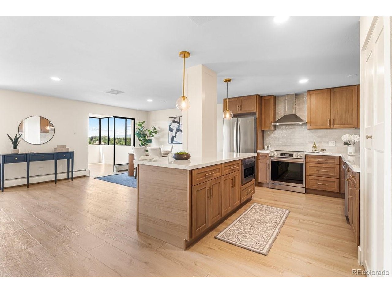 Experience elevated living in Cherry Creek with this fully updated 2-bed, 2-bath condo at 3131 Alameda Ave, Unit 706. From the moment you step inside, you're greeted by panoramic mountain views that make every sunrise and sunset feel special. The location is unmatched - stroll just 10 minutes to Cherry Creek Mall for shopping and dining, or head 5 minutes down the street to Cherry Creek Country Club & Golf Course for a round or a relaxing afternoon. The modern upgrades throughout the unit create a warm, inviting space perfect for entertaining or unwinding. This home blends convenience, comfort, and luxury in one of Denver's most iconic neighborhoods. This is a must see