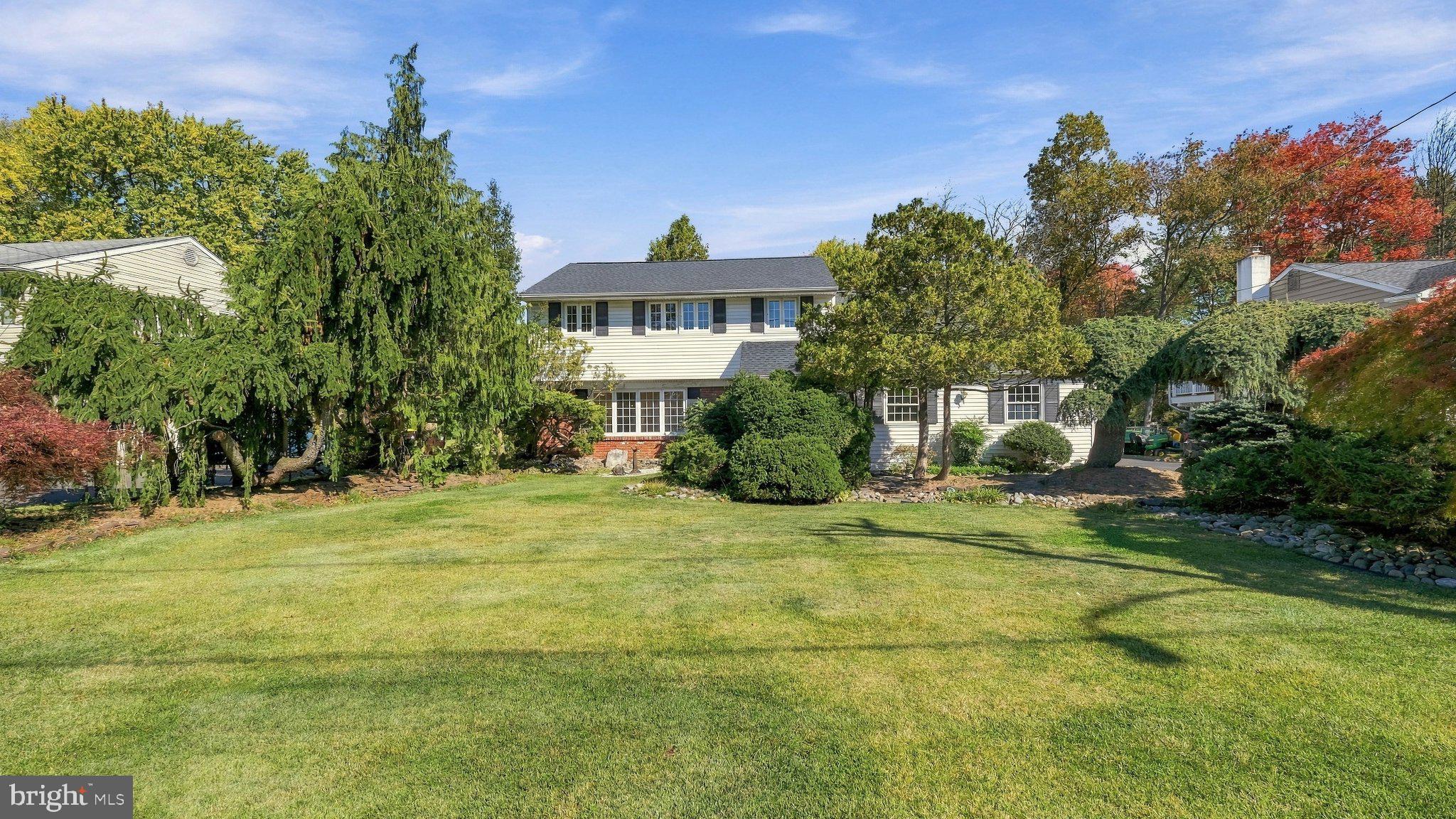 A great opportunity to make this home your own! Situated in a lovely Horsham Township neighborhood known for its larger lots and mature trees, this home has been well maintained by one owner and now ready to pass the batton! Over 2200 SF with a traditional floor plan offering solid bones, great character, and plenty of potential. The property stands out, with beautiful specimen trees, established gardens, and mature landscaping throughout the front and rear yards. Inside, you'll find hardwood floors, comfortable living spaces, a brick fireplace, and a sun-filled vaulted room overlooking the rear yard and the brick patio. This home is ready for your personal touches, offering a great opportunity for buyers who want to add their own style without worrying about big move-in costs, such as a new roof and water heater. Bottom line it is a special property with a great setting and plenty of possibilities!