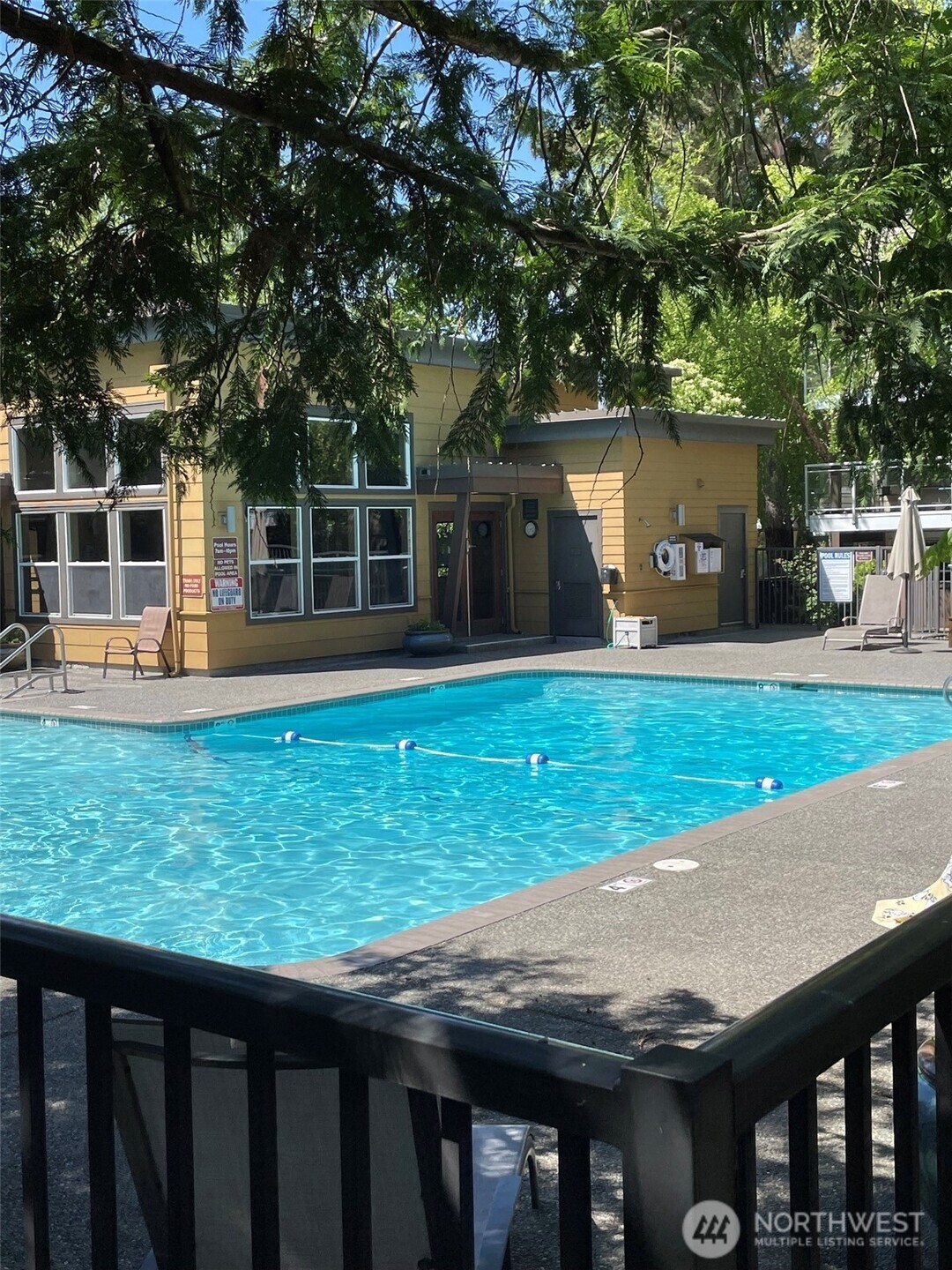 HIGHLY MOTIVATED SELLERS! BUYER ADVANTAGE- Seller offering $10,000 for buyer's rate buydown or towards HOA dues!  Beautiful Sequoyah condo in a resort-like setting featuring a rare 2-level floorplan—ideal for roommates or multi-generational living. Bright, open-concept main level with large windows for abundant natural light, spacious living/dining area, and updated kitchen with granite countertops, stainless appliances and ample cabinetry. Easy, no steps access via patio. Main-level primary suite includes full bath and in-unit washer/dryer. Lower level offers a spacious second bedroom, 3/4 bath, separate living area with fireplace, and private entry—perfect for guests or flexible living. Enjoy a private patio, covered parking, and resort-like amenities including beautiful pool, clubhouse, gym, secure entry, and onsite bike storage. No rental cap, pet-friendly. Minutes to charming downtown Edmonds, waterfront, ferry, I-5, and transit.