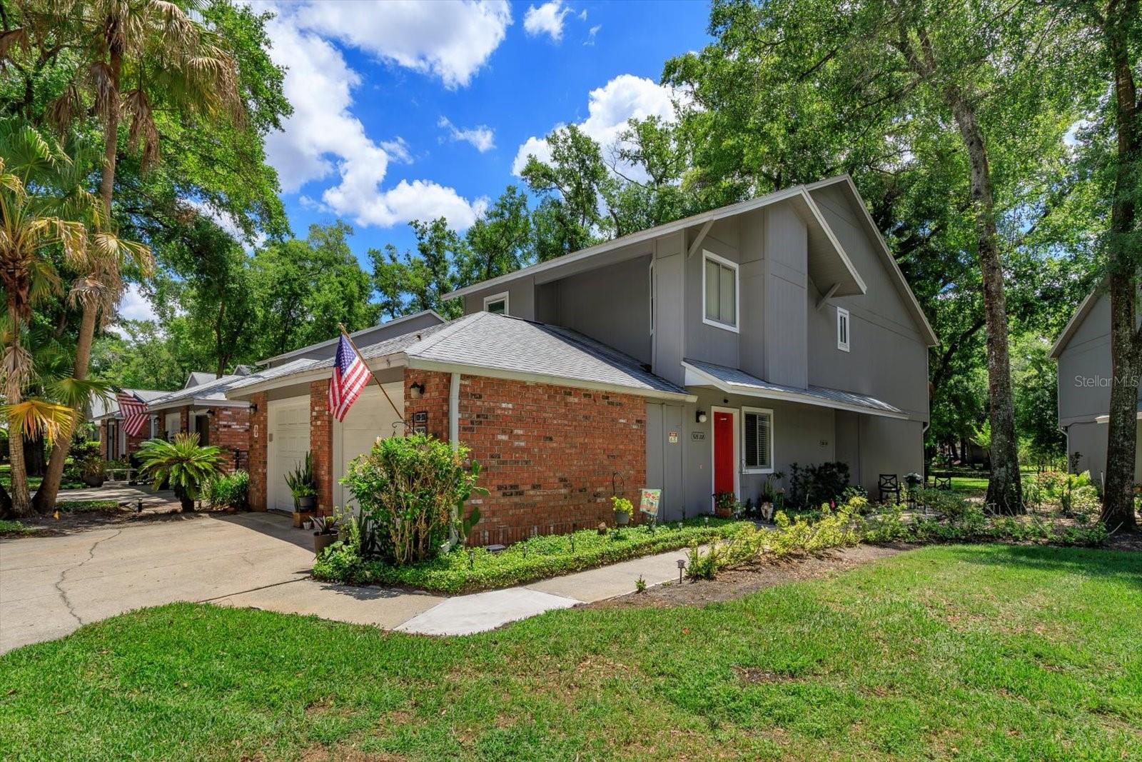 Virtually Staged. LAKEFRONT GATED COMMUNITY - 1ST FLOOR - END UNIT CONDO - 2 BED-2 BATH - ATTACHED GARAGE. TURNKEY OPPORTUNITY.   Whether you’re looking for a seasonal getaway, full-time residence, or easy low-maintenance lifestyle, this condo delivers a unique combination of indoor comfort and outdoor living potential.  Nestled within the heart of Altamonte Springs, this beautifully and well maintained first-floor end-unit condo offers the perfect balance of tranquil living and everyday convenience.  Ideally positioned, the desirable end-unit location allows for added natural light and extra privacy.   The home provides a peaceful retreat right outside your door surrounded by lush tropical landscaping overlooking the sparkling community pool.   FRESHLY PAINTED THROUGHOUT-Natural Light fills the 2-bed-2-bath SPLIT-PLAN DESIGN.  Featuring an inviting OPEN LAYOUT design for comfortable living and easy entertaining.  Spacious living-dining areas flow seamlessly into the ENCLOSED FLORIDA ROOM, glass windows w/screens allow you to enjoy relaxing tropical pool views year-round.  The spacious backyard also offers the rare opportunity to create an additional patio space just off the Florida room for expanded outdoor living— perfect for relaxing, entertaining, or enjoying the beautiful surroundings year-round.  The EAT-IN KITCHEN is bright and functional.  TILE FLOORING extends throughout all wet areas, including the kitchen, baths, foyer, and Florida room.  Warm PARQUET FLOORING enhances the living rm, dining rm, and bedrms adding timeless character and charm.  SOFT NEUTRAL COLOR PALETTE creates a BRIGHT, CLEAN, MOVE-IN-READY atmosphere throughout the home.  PRIMARY SUITE offers sliding glass doors leading directly to the Florida room, WALK-IN CLOSET, and a beautifully remodeled ENSUITE BATH with walk-in shower completed in 2026.  2nd bedrm is privately situated with direct ensuite access to the second full bath featuring a tub/shower combination, making it ideal for guests or family.  Additional highlights: CEILING FANS-WINDOW BLINDS throughout, STORM DOORS-both the front entrance and Florida room, Attached 1-Car Garage w/Washer & Dryer area.  For added peace of mind, HOA has recently completed major exterior improvements: NEW ROOF, FRESH EXTERIOR PAINT, NEW GUTTERS/DOWNSPOUTS.  HOA fee includes PREMIUM CABLE TV & HIGH SPEED INTERNET SERVICE adding exceptional value and convenience.  The welcoming community is known for its beautifully maintained grounds, resort-style amenities, and vibrant social atmosphere of activitIes and events.  Residents enjoy access to a spacious CLUBHOUSE perfect for private entertaining, complete with a full kitchen/bar area, dining tables, reading and CARD GAME RM, and BILLIARDS/PING PONG RM.  Outdoors, the community features 2 SWIMMING POOLS, lakeside PATIO equipped w/GRILLS, umbrella tables & chairs.  Active lifestyles residents enjoy LIGHTED TENNIS/PICKLEBALL/BASKETBALL COURTS designed for comfortable evening play. SHUFFLEBOARD COURTS, FITNESS CENTER, SAUNA, COVERED DOCK & BOAT LAUNCH.  BOAT PARKING- WATER SPORTS RACK STORAGE AVAILABLE.  Altamonte Springs-one of Central Florida’s most convenient locations-endless Shopping, Dining, Entertainment, Healthcare facilities, and major Medical/Hospital Complex.  Beautiful Florida Beaches, World-Famous Attractions, and 2 International Airports are all within an easy drive, making this an ideal full-time residence, seasonal retreat, or lock-and-leave lifestyle opportunity.