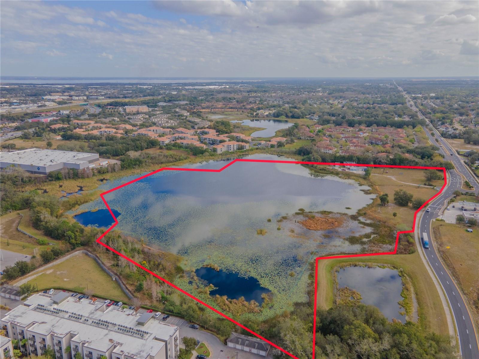 Private BASS LAKE !Own 19 Acre Lake Brian loaded with large mouth bass in the heart of Florida. 30 Minutes to Orlando. This property is located along the north side of County Rd 46A ,South and east of Rinehart Rd . The parcel contains 24.77+ acres, of which approximately 5.5 acres are uplands.  . Property is zoned AG , and the future land use designation is Medium Density Residential by the City of Sanford .