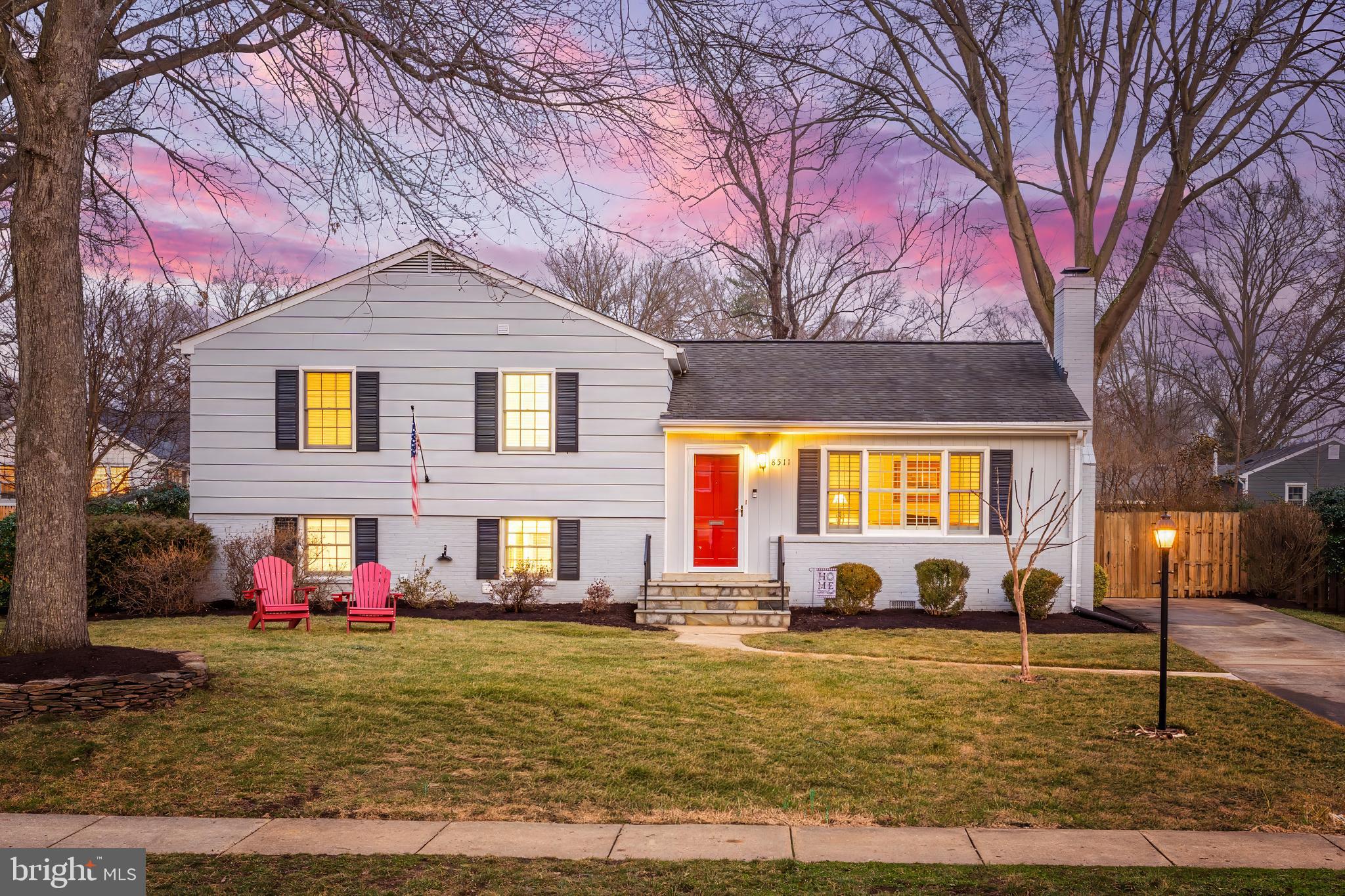 8511 Stable Drive sits in the heart of Riverside Gardens, one of those neighborhoods people move into and tend to stay for a long time because it simply makes daily life easier and more enjoyable. Sidewalk-lined streets, top rated schools, and a true sense of community define the area, where neighbors gather for holiday parades, chili cook-offs, block parties, and fitness classes organized by the Riverside Gardens Citizens Association,(not an HOA), giving the neighborhood a genuine small town feel that is hard to find this close to Washington. Just a short walk away is the Riverside Gardens Swim and Tennis Club where summer revolves around swim team, tennis lessons, yoga classes, and relaxed evenings with friends, while everyday errands are minutes away at the charming Hollin Hall Village Center with its grocery store, bakery, butcher, restaurants, and local shops. From here you are also moments from Old Town Alexandria, the Mount Vernon Estate, the Potomac River, Fort Hunt Park, the Mount Vernon Bike Trail, and one of the most beautiful drives in the region along the George Washington Parkway with easy access into DC, the Pentagon, Reagan National Airport, Fort Belvoir, and the Defense Logistics Agency. Inside, this rarely available Lexington model has been thoughtfully updated with the kind of improvements buyers appreciate right away. The kitchen has been expanded and reimagined from the original layout and now offers generous counter space, abundant cabinetry, new appliances, and a comfortable breakfast area that makes it easy to gather throughout the day. The living room is welcoming and anchored by a gas fireplace that naturally becomes the focal point of the space, while hardwood floors run throughout the main and upper levels, recently refinished to bring out their warmth. Upstairs you will find three well sized bedrooms and two full baths including a primary suite with its own ensuite bath, while the lower level offers additional flexibility with a fourth bedroom, half bath, and new luxury vinyl plank flooring that works equally well for guests, an office, or extended family. Large windows and a new eight foot slider bring in natural light and connect the home to the outdoor space, where a newly refreshed deck overlooks a spacious, fully fenced backyard with plenty of room for gatherings, gardening, or letting kids and pets roam freely. A long driveway provides parking for up to four cars, buried power lines keep the streetscape clean and open, and recent updates such as renovated bathrooms, new windows, refinished hardwoods, and a roof installed in 2011 add to the sense that this is a home that has been well cared for. It is the combination of a comfortable, updated house and a neighborhood that people truly love living in that makes 8511 Stable Drive such a special opportunity in Riverside Gardens.