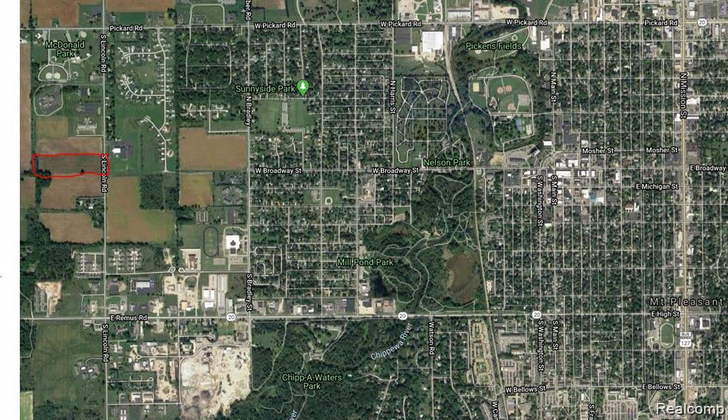 Incredible prime building location opportunity on 10.09 acres with access to utilities, drain, and survey available. Minutes from everything in town with city park up the street and backs up to wooded area. Zoned R2A (low density residential) making this an amazing opportunity for residential or rental development. Buyer to confirm usage information provided.