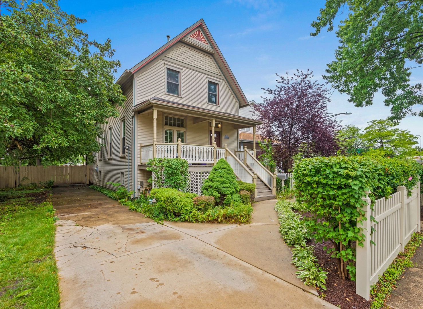 Updated and charming Victorian home in Old Irving Park on a double lot of 50x150'! There is a long concrete driveway to park several cars, and a garage can be built (there used to be one in the back yard).  The main level has a wide open floorplan with a living room, dining area, and a family room. The large and stylish kitchen has loads of cabinet and counter space, high quality wood cabinets, granite counters, a huge kitchen island with seating, tile backsplash and glass front cabinets. The family room also features a wood built-in entertainment center with shelves and cabinets to match the kitchen, and the rear entry has a built-in bench and custom space for coats and backpacks! The powder room and the 4th bedroom are also on this level. The back door by the family room and kitchen lead out to an oversized covered rear deck that overlooks the giant fenced yard! The 2nd floor has 3 bedrooms and a full bathroom. The primary bedroom has vaulted ceilings, double closets, and a wardrobe (included). The finished lower level has a large recreation room with a custom dry bar (included), a large laundry room with side by side washer/dryer and a large counter and cabinets, and a 5th bedroom with en-suite full bathroom and a door to the rear of the home (making this a great option for a roommate, in-law, or au pair living)! Lower level and main level have separate sound systems with installed speakers. Many recent updates include new furnace (2025), new roof, new windows, and drain tile with sump pump! This home is within Belding Elementary school boundaries and the school is only 3 blocks away.  Great access to the Blue Line, Metra and 90/94 for easy commuting to the city, O'Hare or suburbs! Many great dining options nearby including Old Irving Brewery, Eris Cider and Brewery, CTA Tacos, Breakfast House, Starbucks, Backlot Coffee...and even more at nearby 6 Corners! Many parks close by including Kolmar Playlot, Mayfair Park, Belding park, and Independence Park (with Farmer's Market).