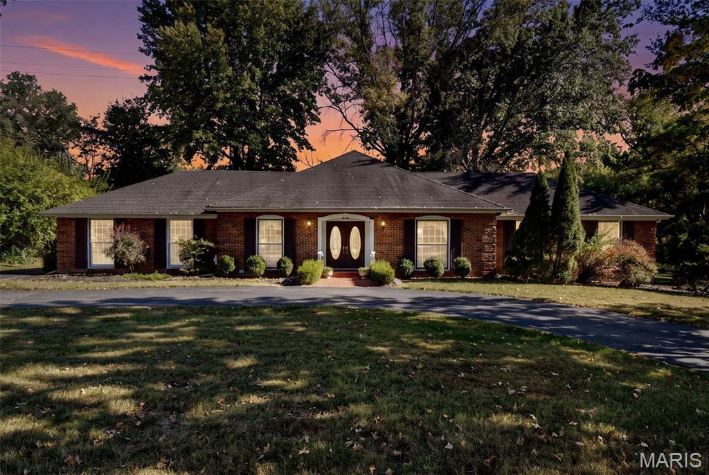 A RARE OPPORTUNITY IN THE HEART OF CREVE COEUR! Imagine the possibilities of transforming this spacious all-brick ranch into the home of your dreams! Tucked away in an exclusive 19-home subdivision just off prestigious Conway Road, 474 Hammermill Drive offers a combination of location, privacy, and potential that's difficult to duplicate. The only single-story ranch in the neighborhood, this home features over 2,500 square feet of main-level living space on a beautiful half-acre-plus lot. The real showstopper? The backyard adjoins expansive neighborhood common ground, creating an incredible sense of openness and privacy surrounded by mature trees and a peaceful wooded backdrop. Inside, generous room sizes, a fireplace, and a spacious footprint provide an excellent foundation for your vision. Whether you envision a stunning new kitchen, beautifully updated bathrooms, or a reimagined layout, the possibilities are yours to explore. Located in the highly regarded Parkway School District, with convenient access to major highways, shopping, dining, schools, and everyday amenities. Homes with this setting and potential rarely become available. Bring your imagination, embrace the opportunity, and create something truly special! Property is being sold as-is.