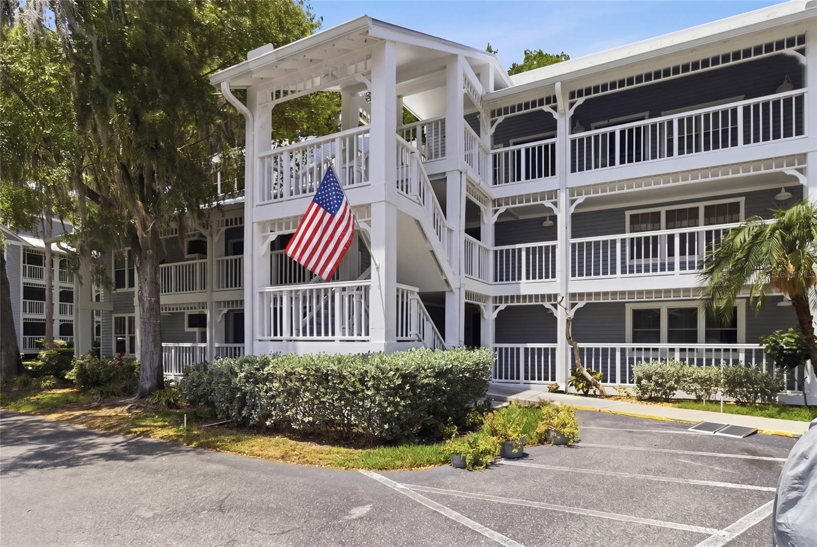 One or more photo(s) has been virtually staged. This RARELY available FIRST-FLOOR 3 Bedroom, 2 Bathroom condo with a wrap-around patio, offers 1,870 sq ft of completely remodeled living space with LOW HOA fees and incredible value for the size and location.  LAKEFRONT COMMUNITY LIVING IN PALM HARBOR Welcome’s you to Palm Harbor’s Hidden Gem — Dolly Bay Condominiums on beautiful Lake Tarpon! Enjoy peaceful conservation views and easy access to the community pier, waterfront walkway, heated pool, clubhouse, fishing areas, and boating amenities just steps from the building. Perfect for those seeking the Florida waterfront lifestyle without the waterfront price tag!This move-in ready condo features luxury vinyl flooring throughout, beautifully tiled bathrooms and showers, gorgeous Corian countertops, updated lighting, stainless steel appliances, updated electrical panel with surge protector, newer water heater, and a spacious open-concept floor plan ideal for entertaining. The oversized primary suite includes an ensuite bath, TWO walk-in closets, separate water closet, and additional linen storage. Two additional bedrooms offer large windows and abundant natural light.One of the standout features is the oversized wraparound screened lanai — perfect for relaxing, entertaining, or enjoying Florida’s year-round outdoor lifestyle.Additional updates include a NEW METAL ROOF (2024) for added peace of mind and worry-free ownership.Community amenities include: heated waterfront pool, tennis courts, grilling area, fire pit, fishing pier, fish cleaning station, clubhouse, kayak storage ($50/year), and boat slips available first-come for only $1,000/year. Conveniently located near shopping, restaurants, Gulf beaches, Tampa International Airport, and top-rated Palm Harbor schools.If you are searching for a spacious Palm Harbor condo, remodeled condo near Lake Tarpon, Florida waterfront lifestyle, or affordable resort-style living in Tampa Bay — this is one you do not want to miss!