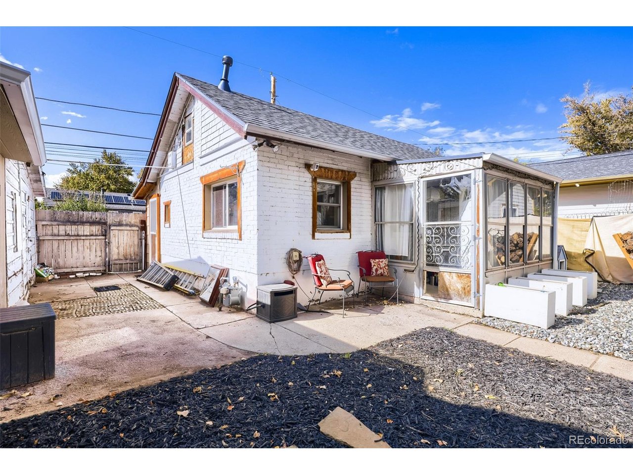 Welcome home to this charming one-bedroom, one-bathroom retreat in the heart of Edgewater. Cozy and full of character, this little gem offers an easy, low-maintenance lifestyle with plenty of room to breathe outdoors.Step outside to a generous front yard, a lovely canvas for gardening, relaxing with a morning coffee, or gathering with friends on warm Colorado evenings. Two small sheds provide handy storage for tools, bikes, and hobby gear, while the detached one-car garage adds welcome convenience and extra space.Tucked into a friendly neighborhood just moments from Sloan's Lake, local shops, restaurants, and easy access to downtown Denver, this home is a wonderful opportunity for first-time buyers, downsizers, or anyone seeking a simple, comfortable place to call their own.
