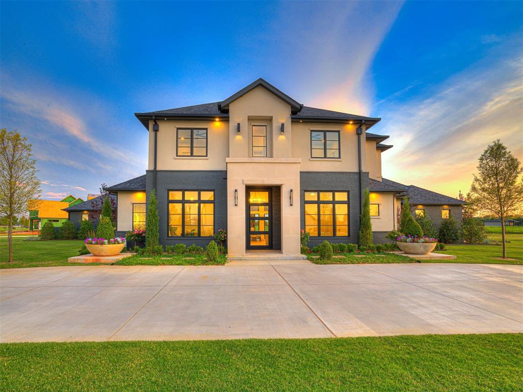 Absolutely stunning new home in West Norman's premier neighborhood, The Ranch at Lost Creek. With a modern yet
 warm aesthetic, this home is highly livable and has a flexible floor plan offering 4850 square feet of living space on over
 an acre. 2 bedrooms are located downstairs and 2 upstairs, all with private baths. Expansive great room is perfect for
 entertaining and opens to the large, covered patio with southwestern views of the Oklahoma sky. The kitchen is a chef's
 dream featuring a commercial range with double ovens, two islands (one which is movable), tons of counter space, and a
 butler's pantry for even more prep space. Dedicated study, a large loft space and additional bonus space you could use for
 an exercise room, theatre or more. Rear entry garage provides beautiful curb appeal and the circle drive allows for guest
 parking. Don't miss out on this amazing, one-of-a-kind home!