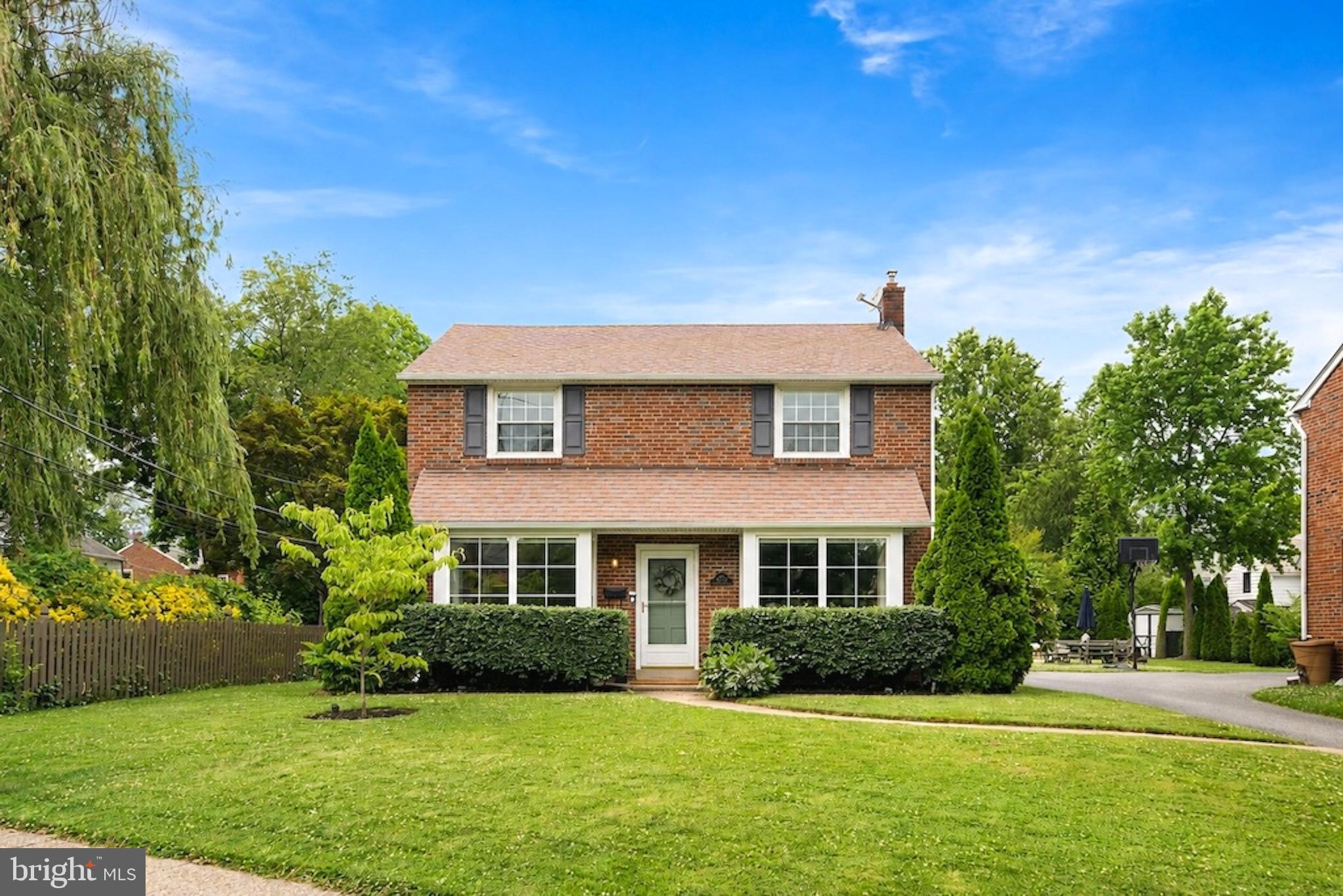 Tucked away on a sidewalk-lined street in the coveted Ardmore Park neighborhood, sits this charming brick Colonial. From the moment you arrive, the inviting curb appeal sets the tone for what awaits inside.Step through the front door into a light-filled entryway and a beautifully maintained home with neutral finishes, timeless hardwood floors, and an abundance of natural light throughout. The spacious living room welcomes you with a floor to ceiling deep-set bay windows that allows sunlight to pour in, creating a warm and inviting space to relax or gather.The sun-filled dining room seamlessly flows from the living space and features updated lighting and another stunning floor-to-ceiling inset bay window. The updated kitchen offers stainless steel appliances, ample cabinetry, and a functional layout designed for everyday living and entertaining.Just beyond the kitchen is a versatile flex space currently used as a playroom, but easily adaptable as a home office, den, or additional living area. This thoughtfully designed extension also includes a convenient powder room and a glass slider leading to the expansive, flat, and private backyard. Upstairs, you’ll find three generously sized bedrooms, each offering excellent closet space and storage, along with an updated hall bathroom featuring a tub/shower combination. The finished lower level provides even more living space with room for a home gym, recreation area, playroom, or bonus space, plus a full bathroom, laundry area, and additional storage.Beyond the home itself, the location is truly exceptional. Enjoy the ease of sidewalks to local parks, playgrounds, Carlino’s Market, the library and all that Ardmore and Suburban Square have to offer. With easy access to SEPTA and Amtrak rail lines to Philadelphia and New York, this is Main Line living at its best!