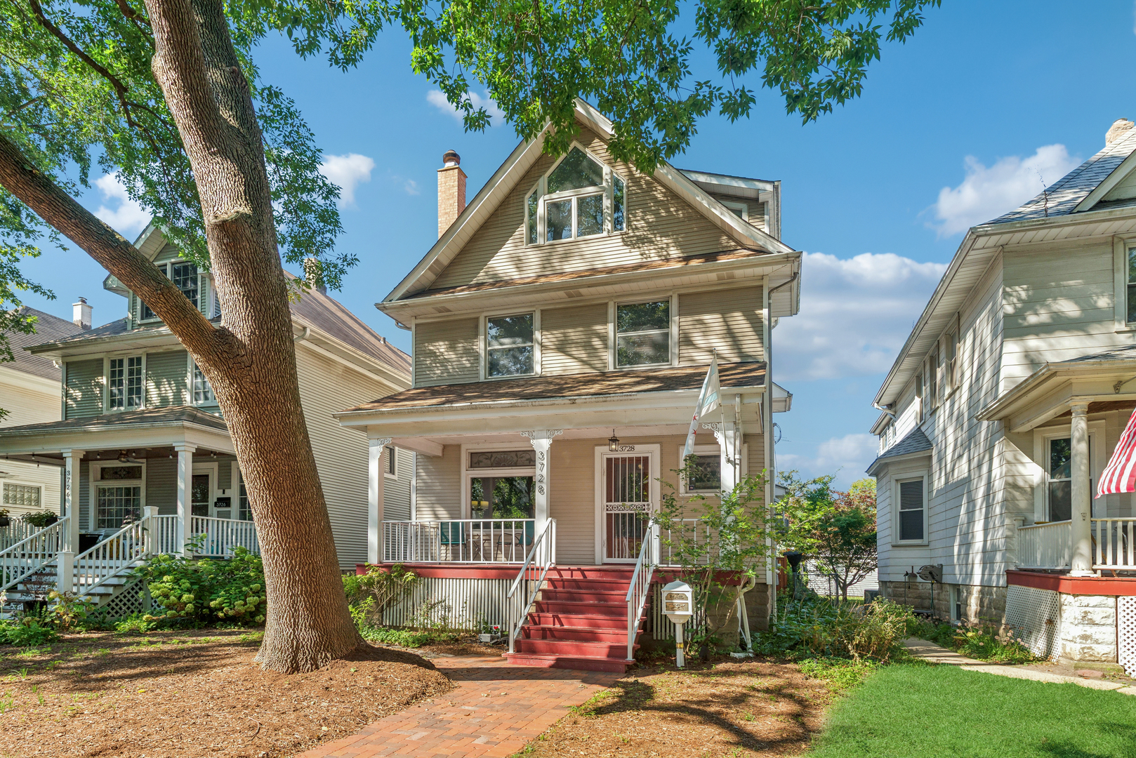 Set on an extra-wide and deep lot in Old Irving Park, this timeless home blends vintage character with generous living space. Discover beautifully preserved vintage details, from wood trim to stained glass transoms. Four levels of living space with generous room sizes offer plenty of flexability for today's lifestyle.  The main level flows seamlessly from the formal living and dining rooms to a cozy family room space that leads to the bright three season porch.  Upstairs are three nicely sized bedrooms, two currently used as offices, with good storage space and a full bath. Continuing up to the 3rd floor you find a huge primary suite with a fire place, dressing area, and wet bar perfect for having that first cup of coffee ready the moment you wake up. There is a sitting area, currently used as a work space, and a bath with separate tub and shower and heated floors. The lower level is finished with a recreation room, exercise room and laundry area and plenty of built in storage, perfect for a play space or exercise room. The large backyard has new fencing, with a new paver patio and walkways and shrubery that was just completed. A newer (2022) three car garage with "party door" completes the picture. Wonderful and convenient location near shopping and restaurants with great access to 90/94 and a short walk to the Metra and the Blue Line. OFFERS DUE MONDAY SEPTEMBER 29 AT NOON