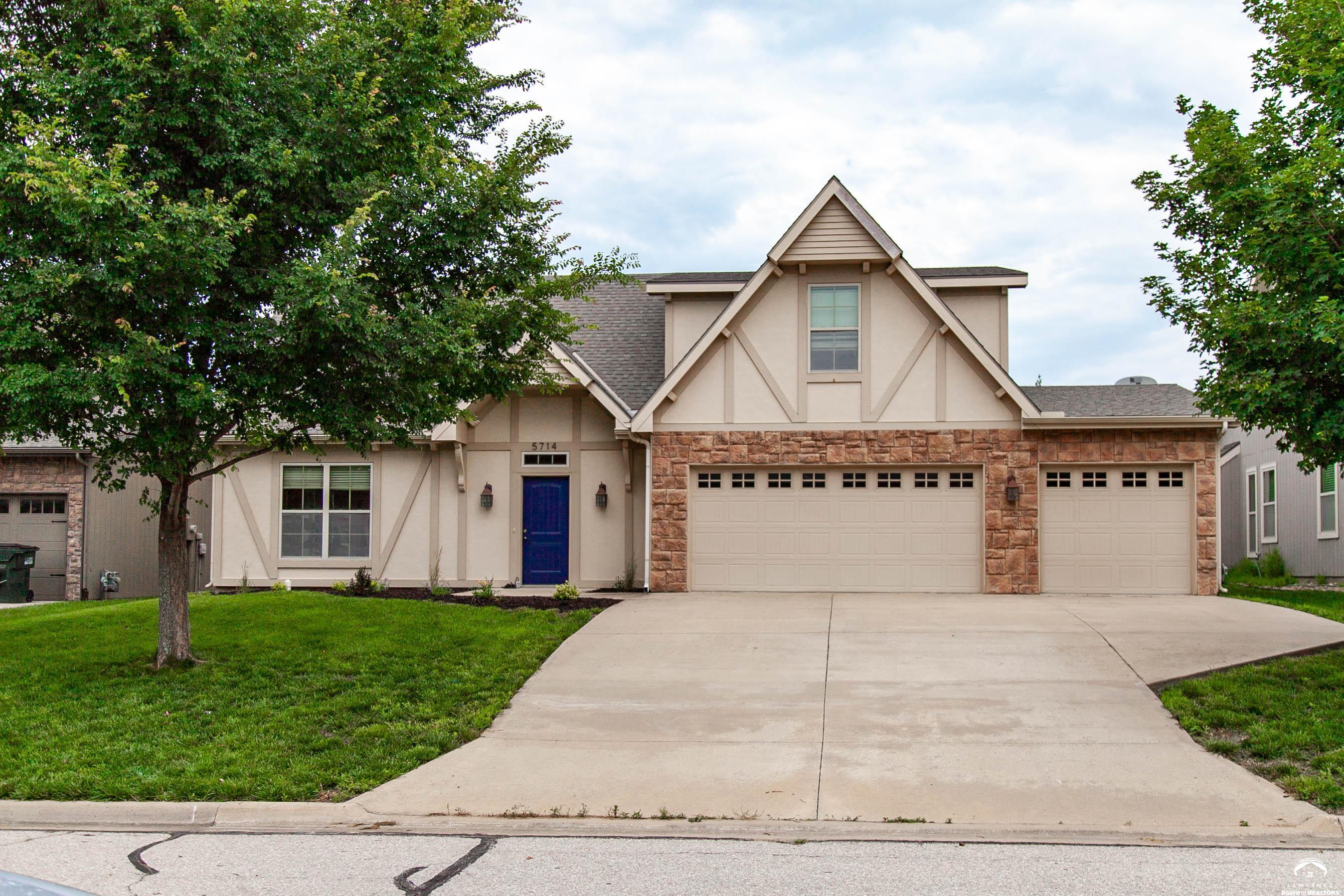Discover comfortable, stylish living in Lawrence with this move-in-ready home at 5714 Silverstone Drive. Priced at $464,900, this spacious 2,332?sq?ft two-story home built in 2011 offers 4 bedrooms, 2.5 bathrooms, and a thoughtfully designed open floor plan that flows across two separate living areas.  The main level offers a versatile layout ideal for daily life or entertaining. A second living area adds flexibility—perfect as a family room, home office, or play zone. The modern kitchen boasts stainless steel appliances, generous cabinetry, a pantry, and a sunny breakfast nook cabinetry and eat-in design make it a highlight of the home You'll find all four bedrooms upstairs, anchored by a spacious primary suite. The full main bath, three-quarter bath, and powder room offer convenience and functionality across levels   This highly functional home includes a 3-car garage with a built-in storm/safe room, providing added peace of mind. A fenced backyard and a dedicated patio area offer a private outdoor retreat for gardening, relaxation, or entertaining   Don’t miss this opportunity—book your private tour today!