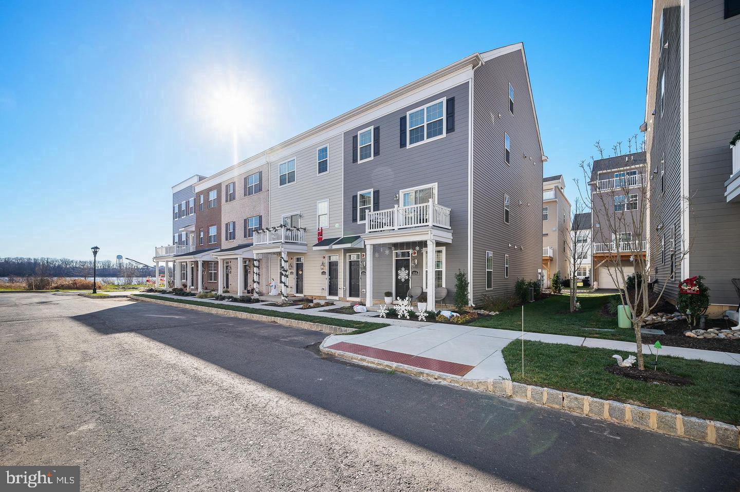 Incredible opportunity to Spring into your dream home, perfectly located just a stone's throw from the scenic waterfront park. Begin your days with serene walks or unwind in the evenings, soaking in breathtaking views of the Philadelphia skyline and Delaware River. The Delaware floorplan, a favorite at Waterside by Lennar, offers an exceptional living experience. This home features a convenient one-car garage and welcoming foyer on the entry level. Elevate your lifestyle literally and figuratively with your own private elevator leading to the main living space. This floor boasts a well-appointed kitchen and an inviting great room, perfect for both entertaining and relaxation. The primary bedroom, a peaceful retreat, is also located on this level. The upper level opens to a versatile loft space, complete with an additional bedroom, full bath, and ample area for a home office, media room, or gym - tailored to your needs. Step out onto your private terrace and embrace the great outdoors. Located in the vibrant community of Waterside in Bensalem, this property offers convenient access to I-95 and is a mere 12 miles from Center City Philadelphia.
