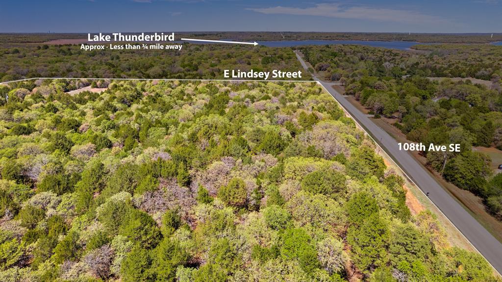 OWNER FINANCING IS AVAILABLE. 26 acres about a mile from Lake Thunderbird, bring your vision. You will have quick access to boating, fishing, beaches, and miles of trails. Dream home, custom estate, barndominium, shop or barn, horses, hobby farm, cattle, recreational property for ATV riding, camping, hunting, or a multi-generational setup. Large acreage this close to the lake is hard to find. Electric is already run to the property and there is a private water well. The land is heavily wooded, offering privacy and a natural setting. The ideal location to build a home would be on the east side of the property off 108th Ave SE, providing privacy and strong positioning on the land. With the right placement, you may be able to capture lake views while still enjoying the space and seclusion that acreage provides.