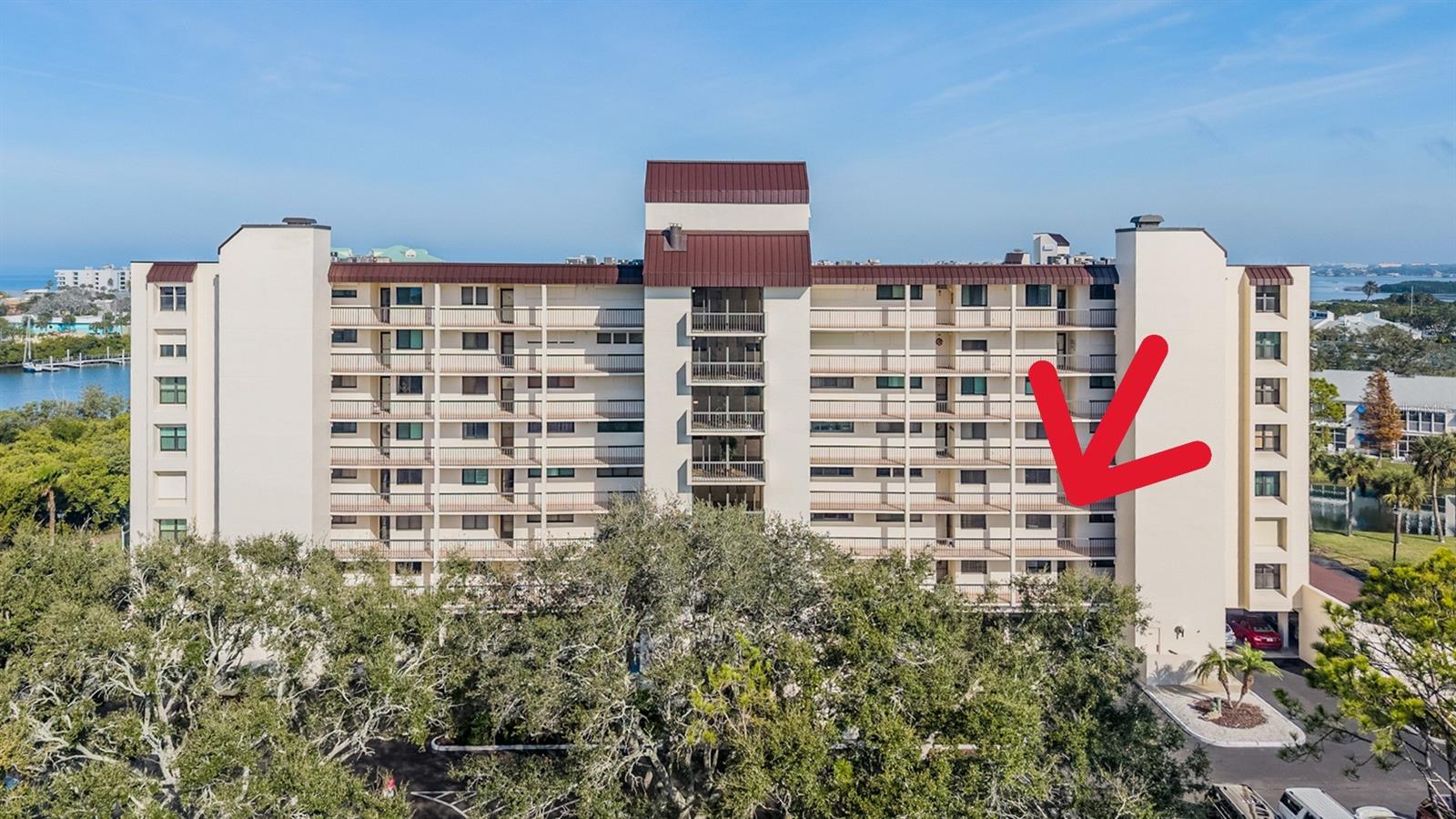 WOW - WHAT A GREAT VALUE!! Welcome to your slice of paradise at Shipwatch Yacht and Tennis Club! This TWO BEDROOM condo is all about COASTAL LIVING. The main living space is comfortable and FLOODED WITH NATURAL LIGHT from the sliders which offer views of the beautiful ponds and grounds of the community and a peek at the ICW. The KITCHEN is bright with ample cabinet and counter space and room to Eat-in. The spacious PRIMARY SUITE is your personal retreat with balcony access and NATURE VIEWS OF THE PONDS,TURTLES AND BIRDS. A walk-in closet and EN-SUITE BATH featuring a tub/shower combination complete the room. The second bedroom is large, ideal for guests or family. You will love the BALCONY- enjoy the breeze and soak in the SERENE ATMOSPHERE and stunning sunsets. Hurricane shutters will give you peace of mind.  You have an UNDERBUILDING RESERVED PARKING SPACE, 4x6 private storage closet on the ground floor and SECURE LOBBY entry.  Shipwatch has so much to offer - 54 landscaped acres bordering the Intracoastal Waterway- 2 POOLS, hot tub, 11 Har-tru tennis courts, PICKLEBALL COURTS, Fitness room, 2 Clubhouses, MARINA and a variety of regular and special activities! SO CLOSE TO THE BEACH, great restaurants, and shopping. Come see for yourself - YOU WILL LOVE IT! No Milestone Inspection Issues Here! The Community suffered no flooding issues during the 2024 storms!  Make this yours today!