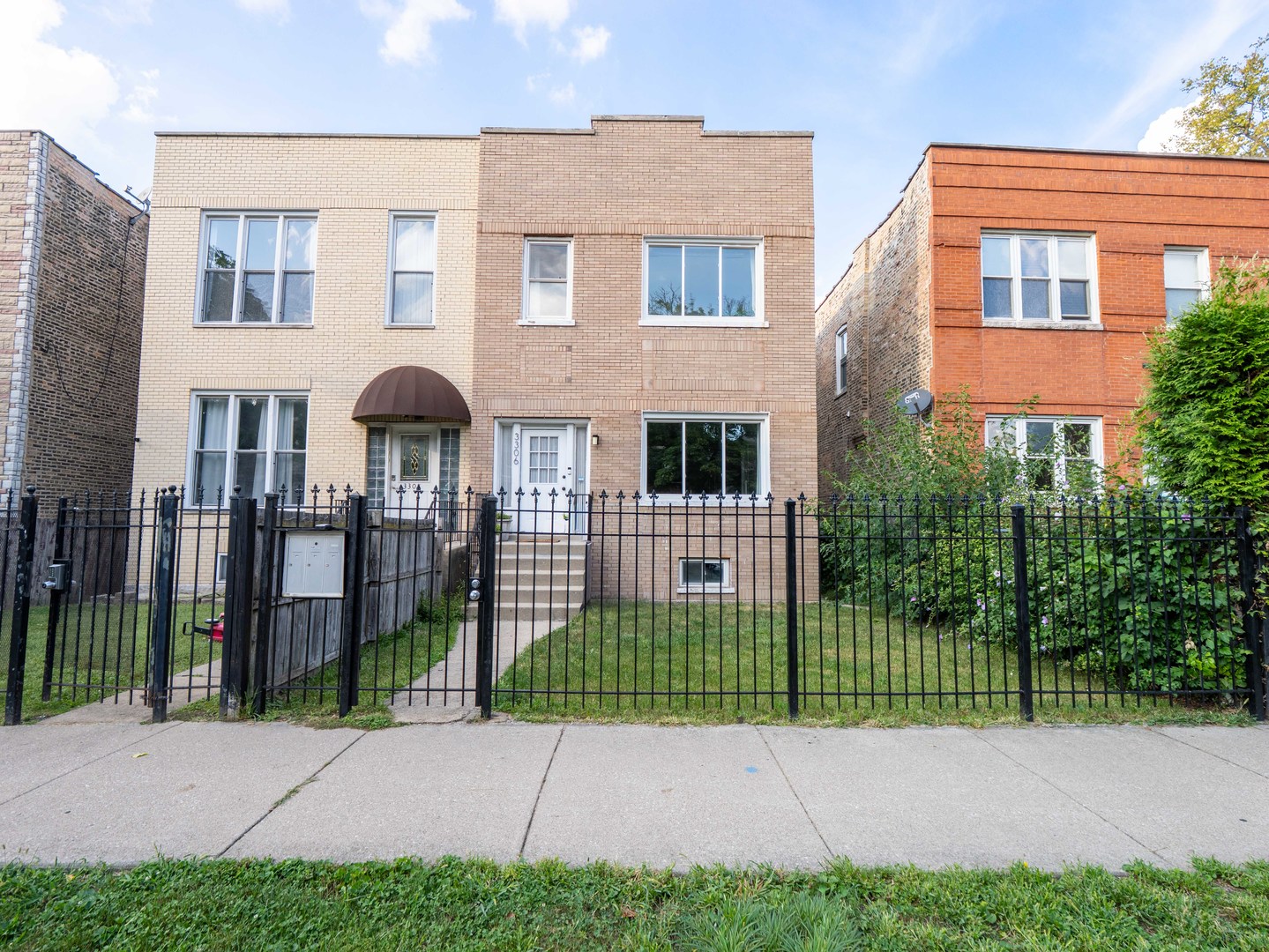 ALL NEWLY RENOVATED brick farm house, originally built in 1888 before the first World Fair. This property is for EVERYONE- those who want new construction and those who love historic charm. The location, just a block west to Humboldt Park, IS on the brink of becoming THE MOST POPULAR spot in CHITOWN! Enjoy 197.26 acres of Humboldt Park with baseball fields, miles of running, ponds, field houses, and tamale trucks. A couple blocks away is Roeser's Bakery, a quick bike ride to the 606 trail!, enjoy proximity to Logan Square restaurants and shopping on Armitage, easy access to the expressway at Kimball, head west and be in Oak Park in a few minutes, ride a bike to the other side of the park and grab a bagel at Steingold's after you get your work out in at 'First Ascent Climbing' gym. This home was most recently purchased by a local Chicago designer who studied at our very own: the Art Institute of Chicago and the entire home was completely remodeled and renovated for her own family. This darling dazzler exudes a Scandinavian sophistication of quality and attention to detail in every space. The floor plan is open and the entire home is pleasantly filled with light and positive vibes. It's a few steps up to the picture glass front door and a gorgeous tile vestibule that welcomes you into this very happy home. Super high ceilings and wide plank white oak flooring make it easy to drop your keys and take off your shoes. Find a completely new kitchen with butcher block walnut counters, a porcelain farm sink in the island, gray cabinets with lots of built-ins, drawers and other features, white tile backsplash and stainless steel appliances. On the main floor find an eat-in island, an attached modern breakfast table, and a open layout to the living and dining room that overlooks the front yard. Also on the main floor find an office/ 4th bedroom and a darling playroom that can also double as a family room. At the top of the second floor is a skylight and an arched doorway that radiates creativity. The master bedroom has a massive attached walk in closet with wardrobes and attached shelves offering additional hanging space. Upstairs are two more bedrooms and a perfectly located laundry room (near the bedrooms) with more storage and a sink. Fall in love with two full renovated bathrooms ( one on each floor) with custom tile, custom glass enclosures, lighting and seamless floor drains. The basement is fully finished, freshly painted and cleaned with a kitchen, family room, two bedrooms and a full bathroom (a really great home office with its own private detached entrance.) On each floor is a private deck space with room for a table and chairs or an outdoor sofa. Recently tuck pointed, newly coated flat roof, newly capped chimneys, new gutters, new rear vinyl siding, new back deck and stairs!!, new down spouts, all new electric everywhere in the house, all new copper plumbing and new plumbing connection to the city service all in 2023. NEW garage siding, new landscaping in backyard, newly painted front fence. NEW AC.